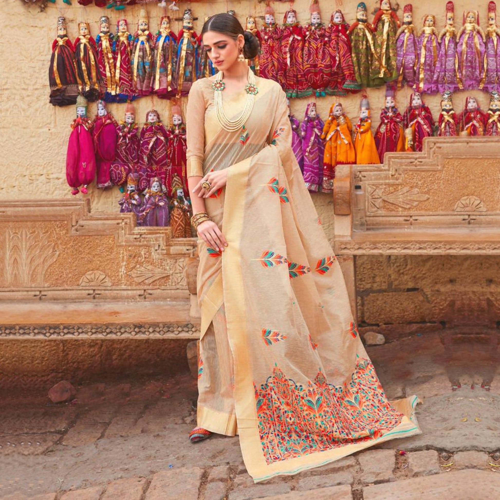 Energetic Cream Colored Partywear Printed Linen Saree