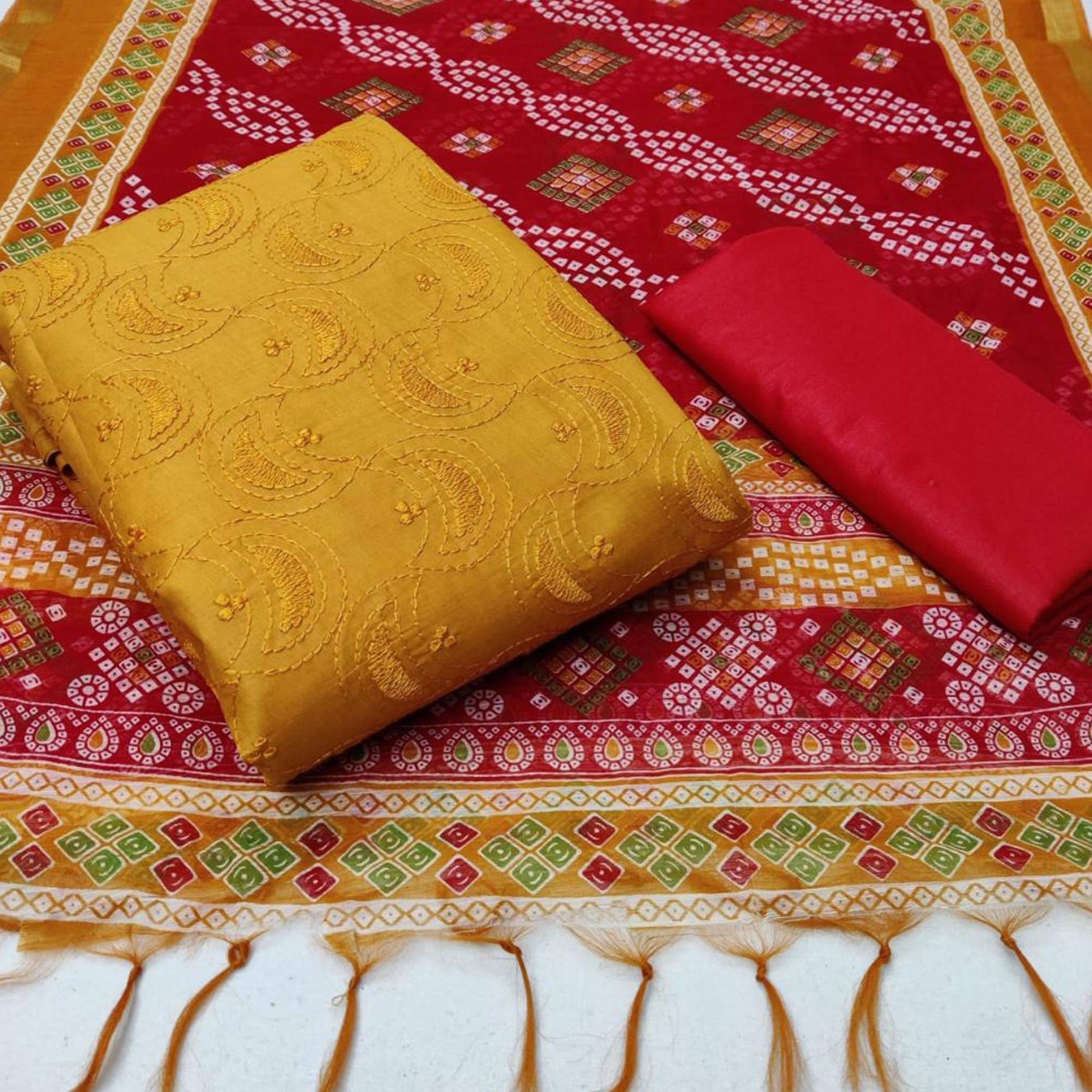 Energetic Mustard Yellow Colored Casual Wear Embroidered Cotton Dress Material