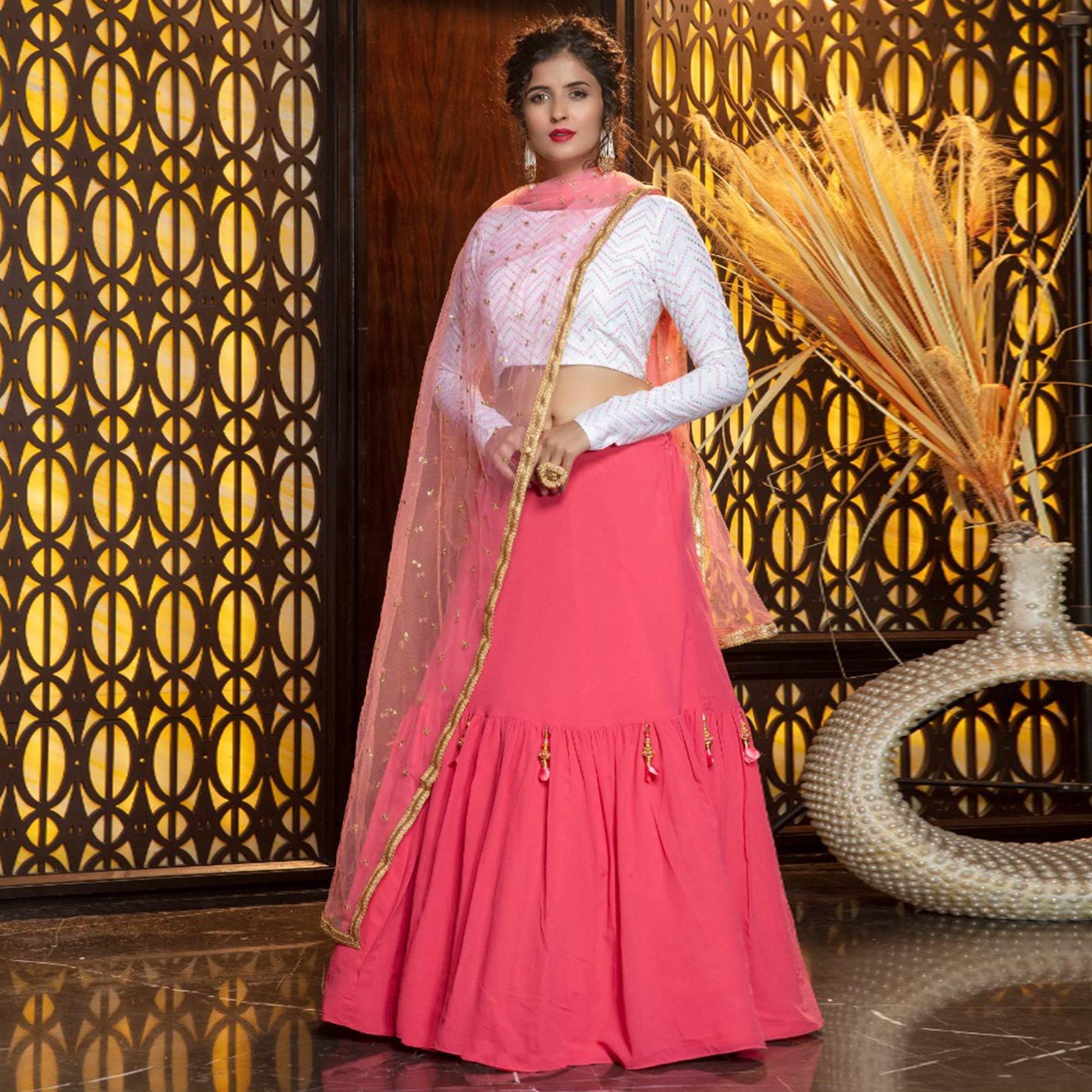 Energetic Pink Colored Partywear Foil Printed Georgette Lehenga Choli
