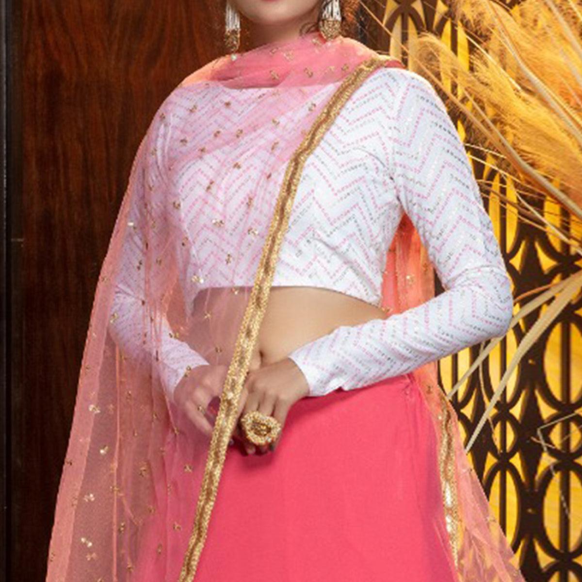Energetic Pink Colored Partywear Foil Printed Georgette Lehenga Choli