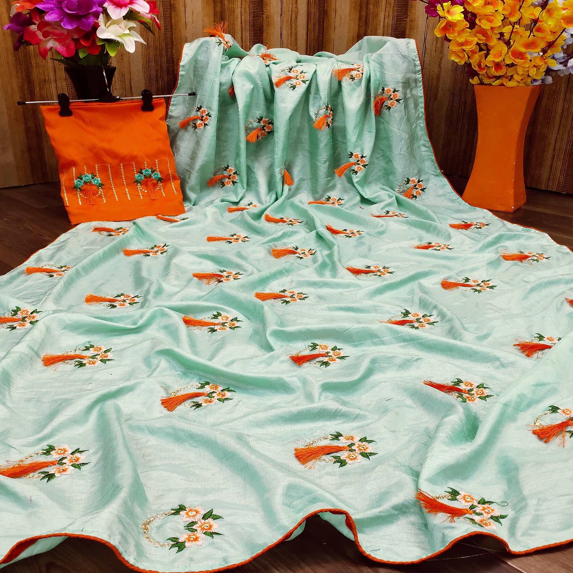 Energetic Sea Green Colored Partywear Embroidered Dola Silk Saree
