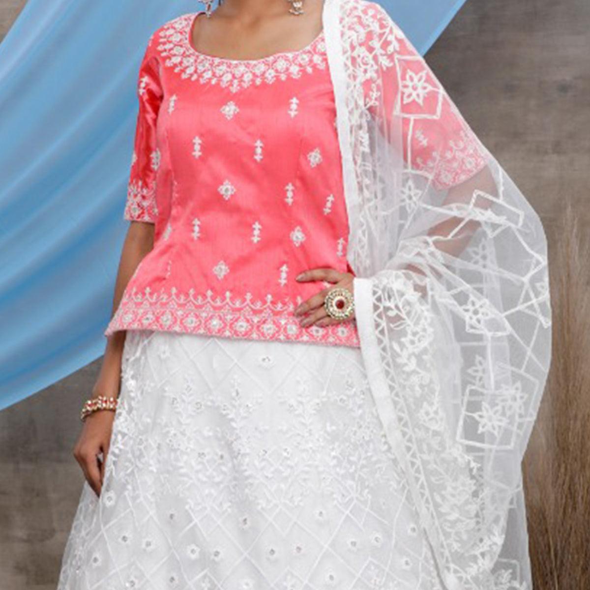 Energetic White-Pink Colored Party Wear Embroidered Net Lehenga Choli