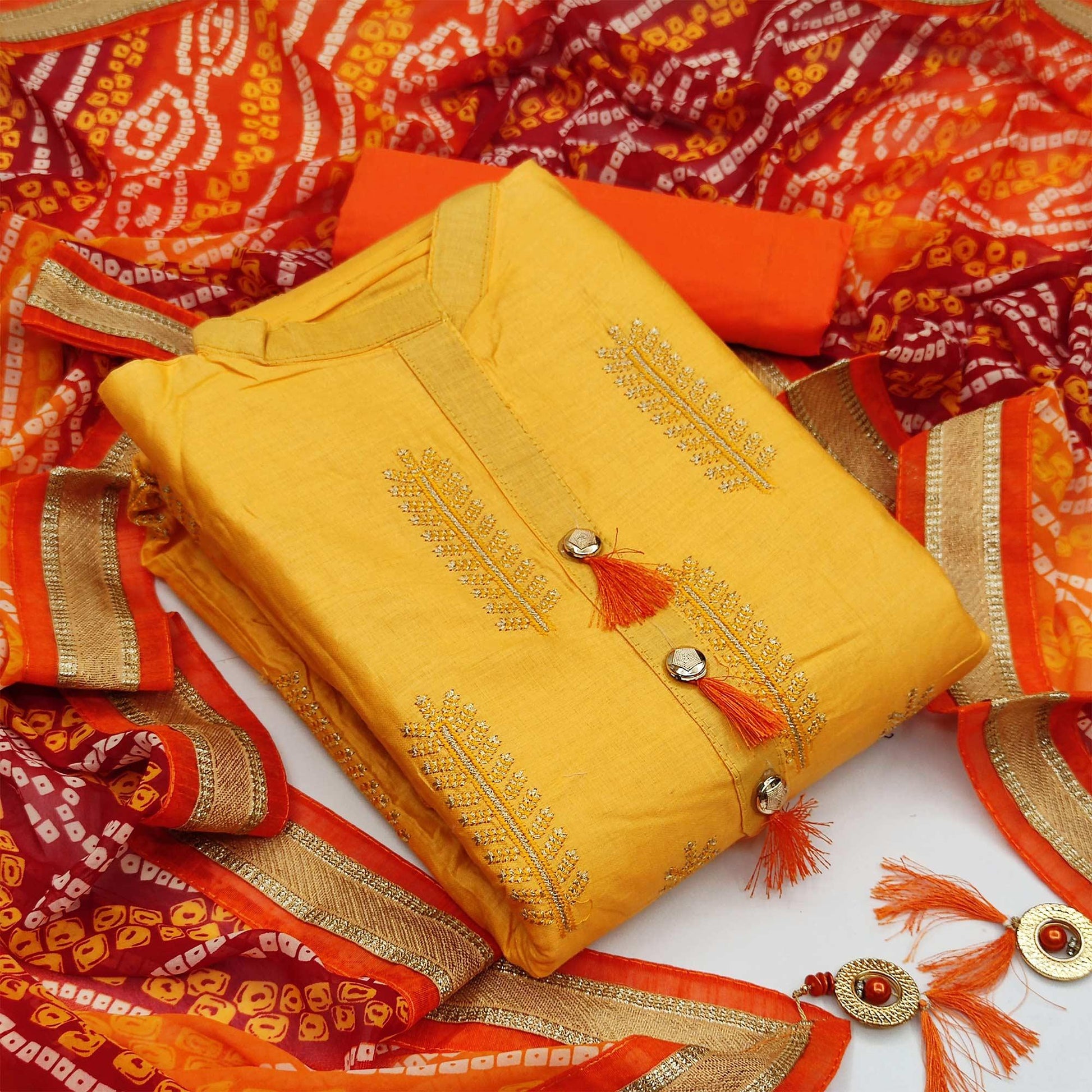 Energetic Yellow Colored Casual Wear Embroidered Cotton Dress Material