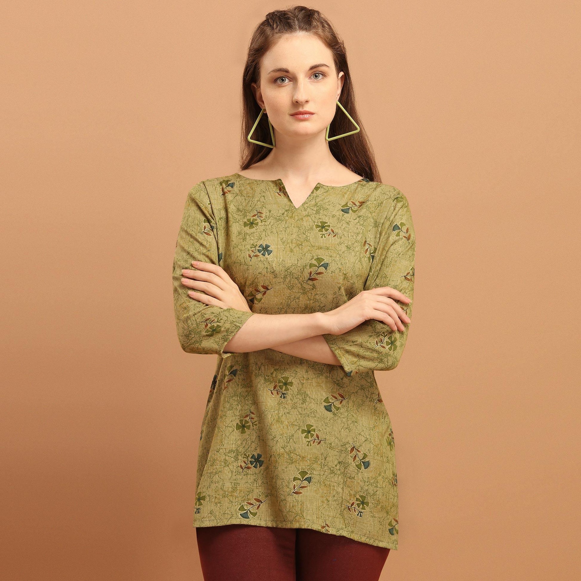 Engrossing Green Colored Casual Wear Printed Rayon Top