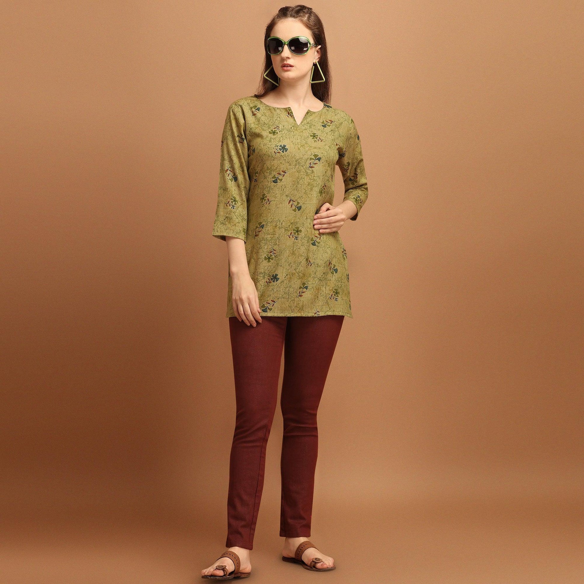 Engrossing Green Colored Casual Wear Printed Rayon Top
