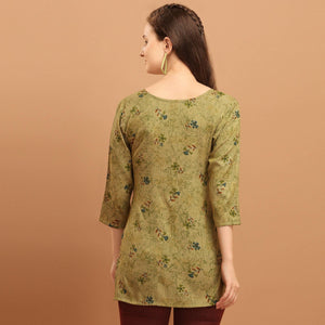 Engrossing Green Colored Casual Wear Printed Rayon Top