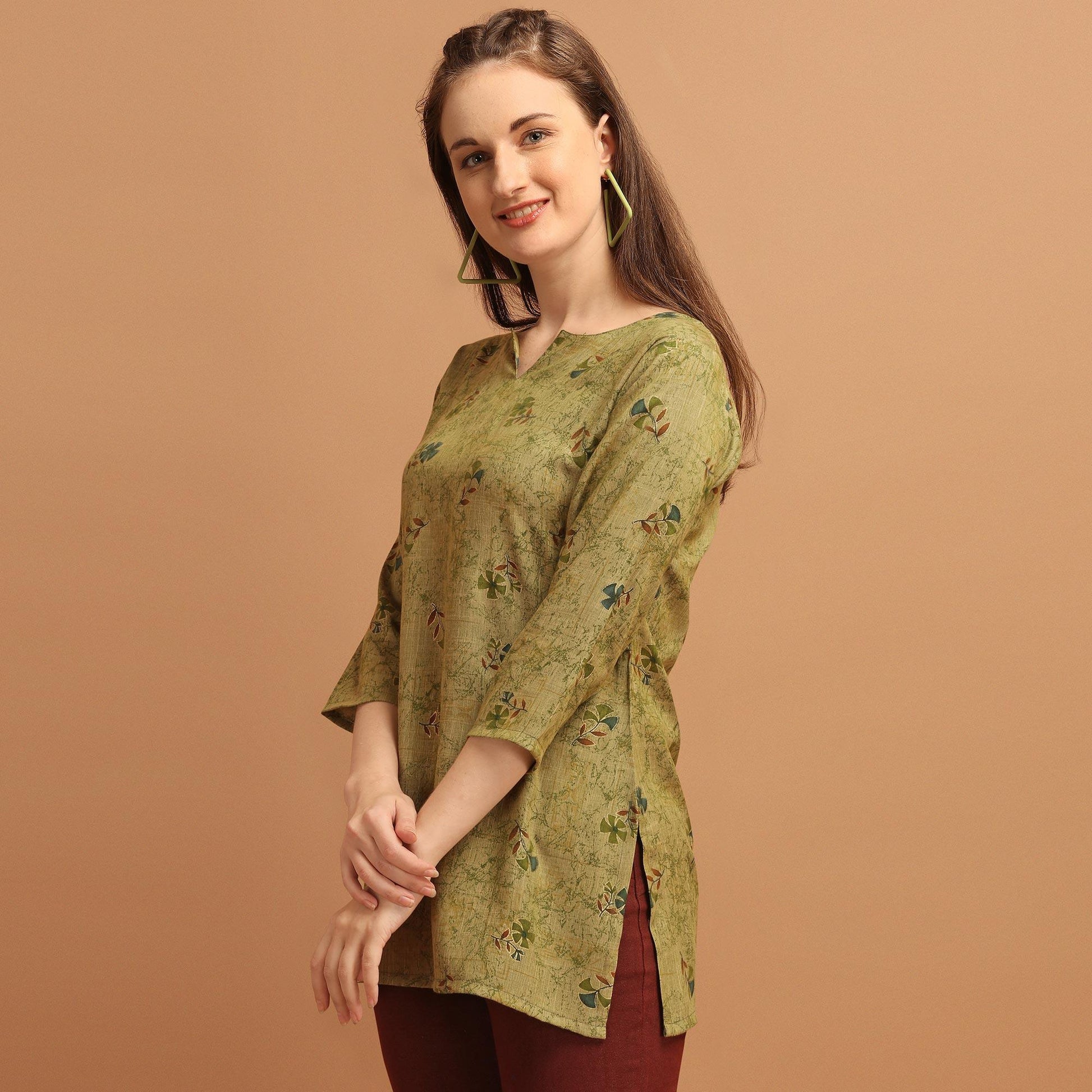 Engrossing Green Colored Casual Wear Printed Rayon Top