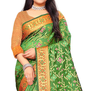 Engrossing Green Colored Festive Wear Woven Silk Saree