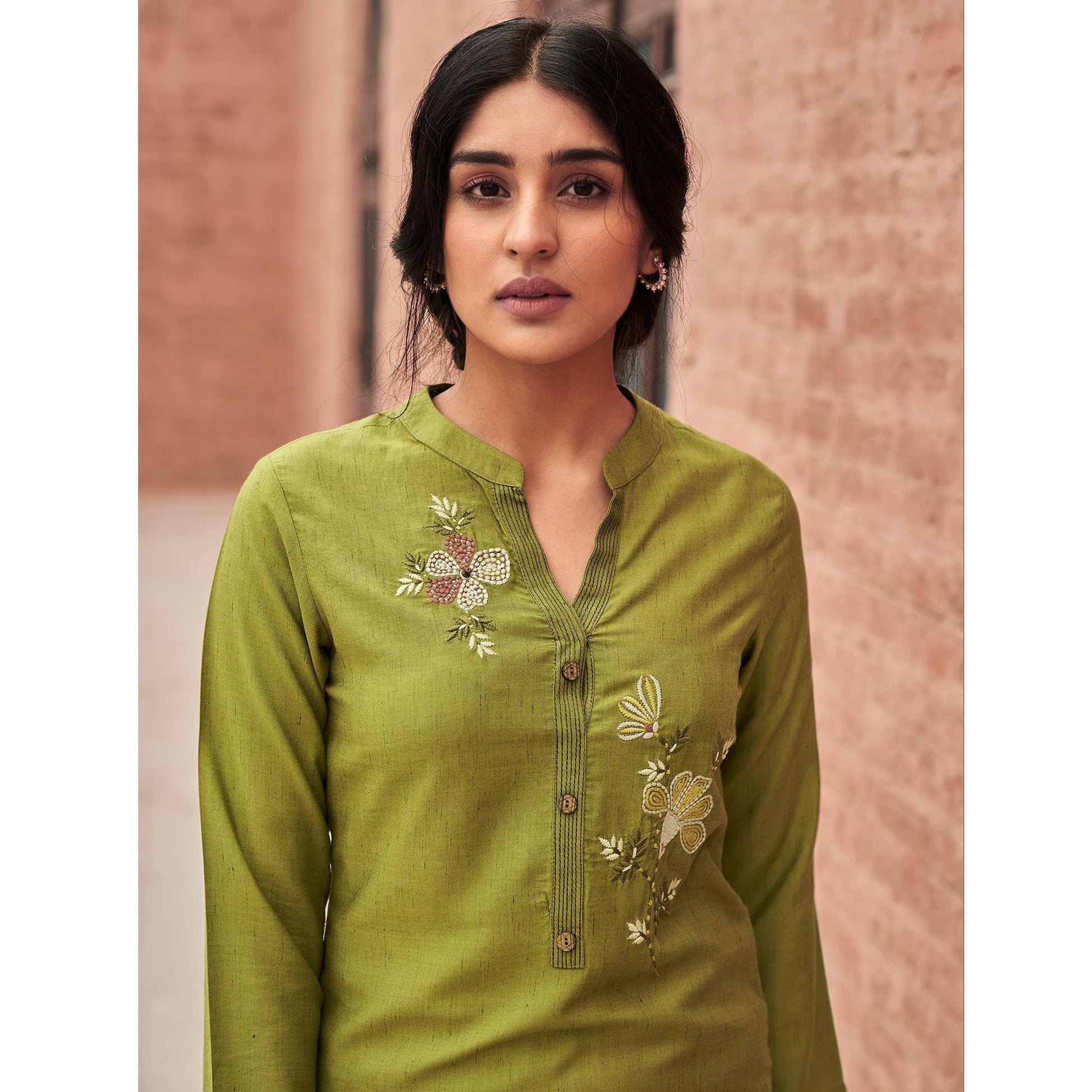 Engrossing Green Colored Partywear Embroidered Pure Viscose Kurti