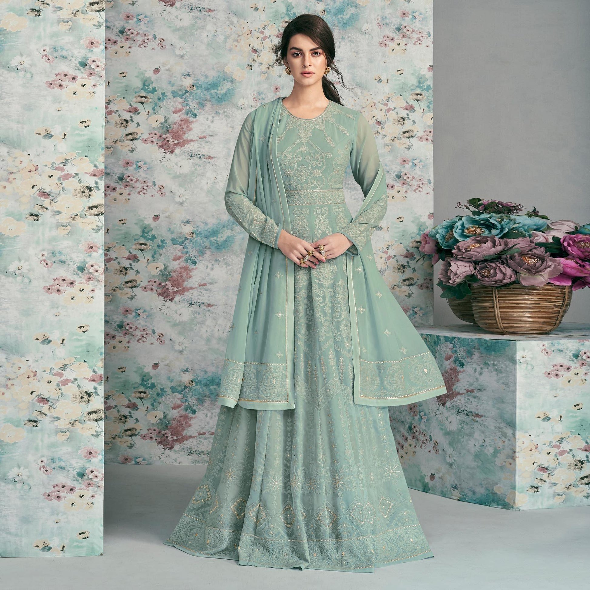 Engrossing Mint Green Colored Party Wear Embroidered Heavy Faux Georgette Anarkali Suit