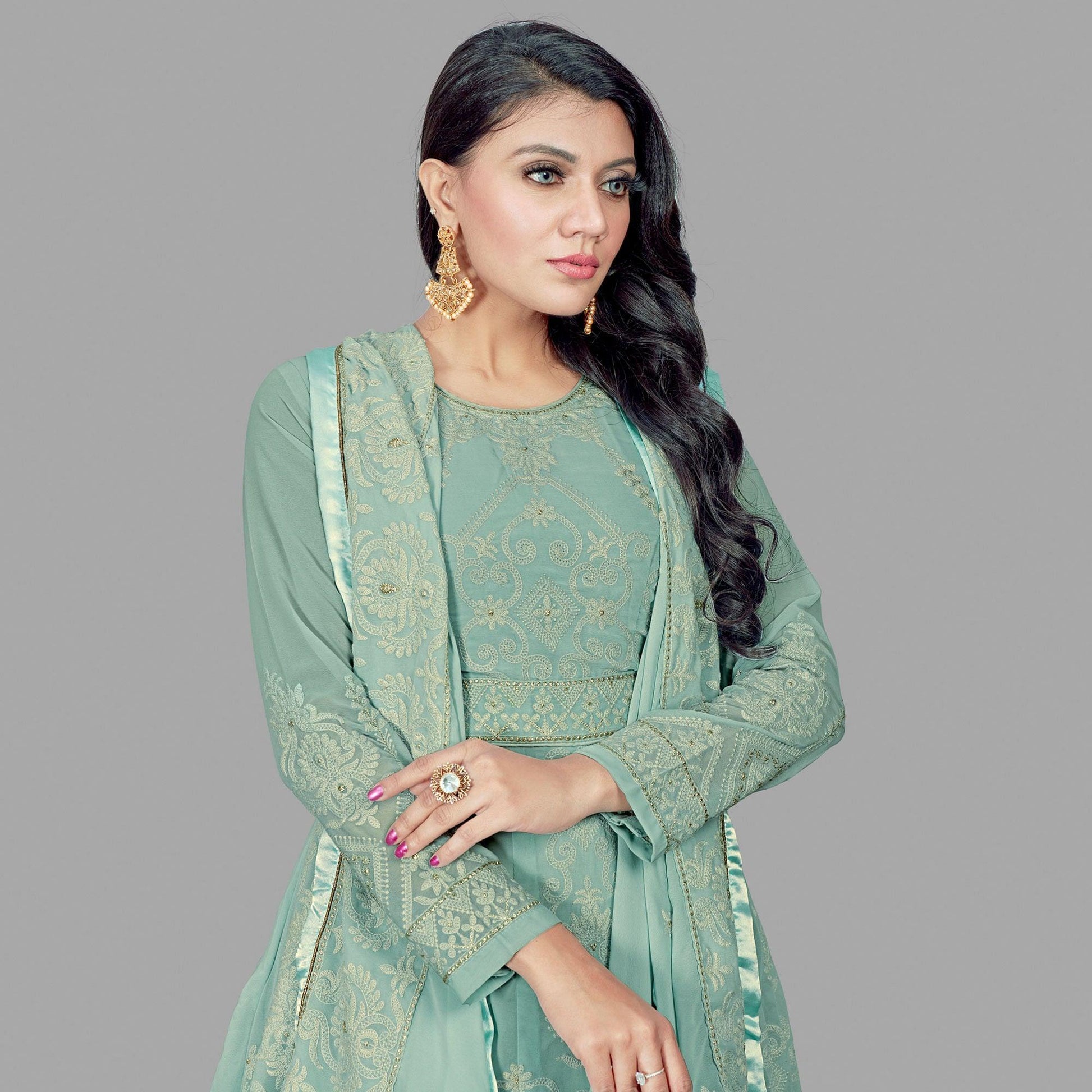 Engrossing Mint Green Colored Party Wear Embroidered Heavy Faux Georgette Anarkali Suit