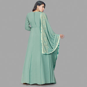 Engrossing Mint Green Colored Party Wear Embroidered Heavy Faux Georgette Anarkali Suit