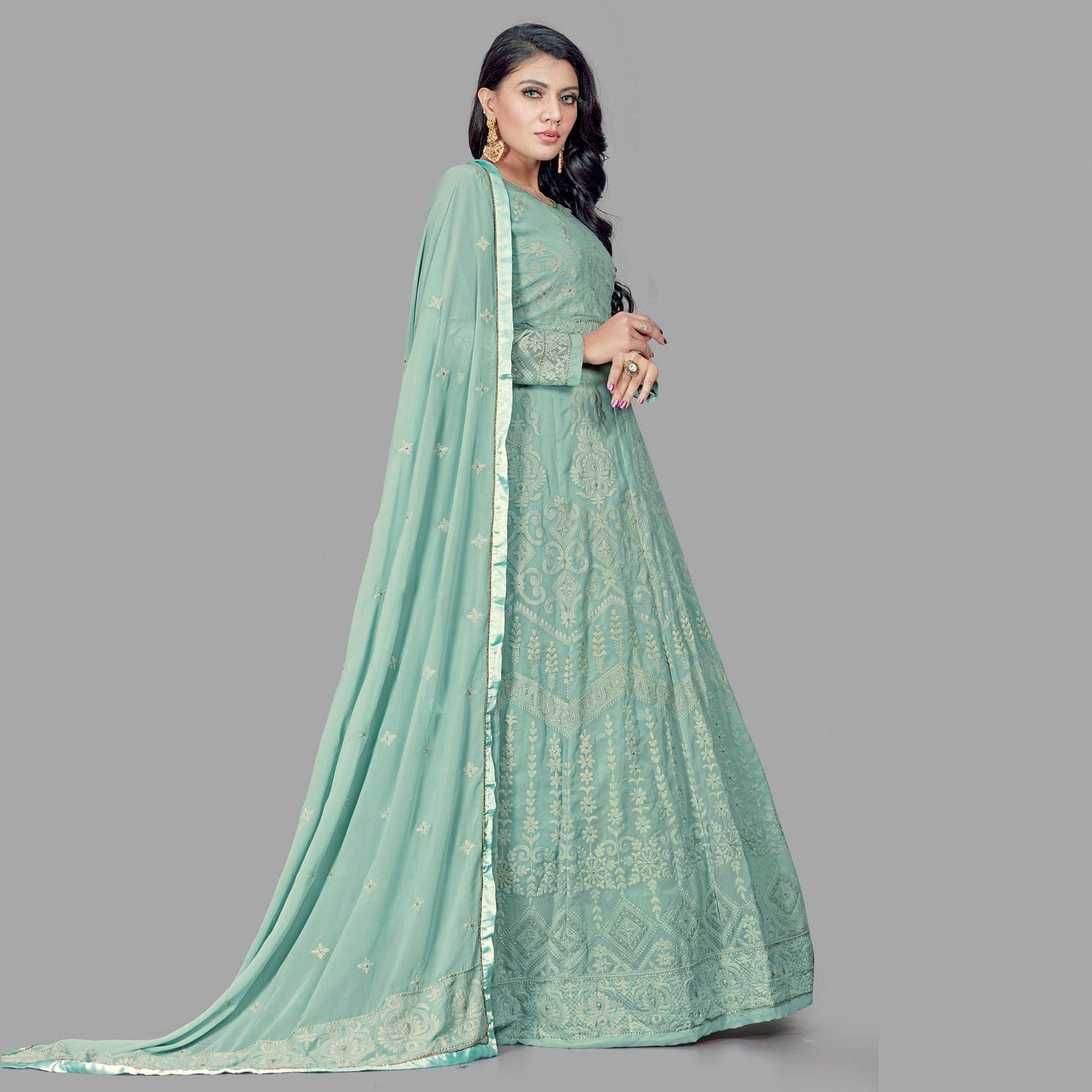 Engrossing Mint Green Colored Party Wear Embroidered Heavy Faux Georgette Anarkali Suit