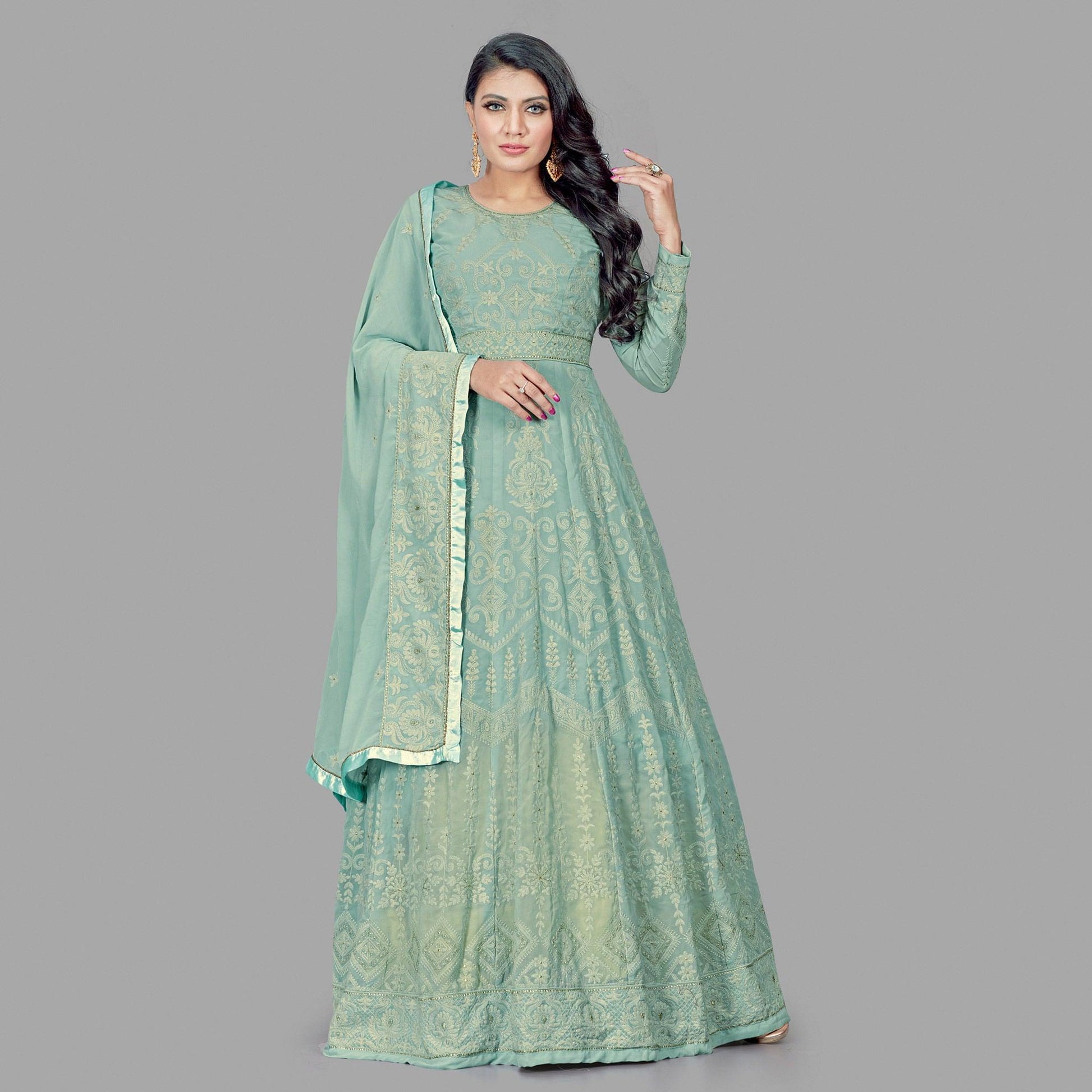 Engrossing Mint Green Colored Party Wear Embroidered Heavy Faux Georgette Anarkali Suit