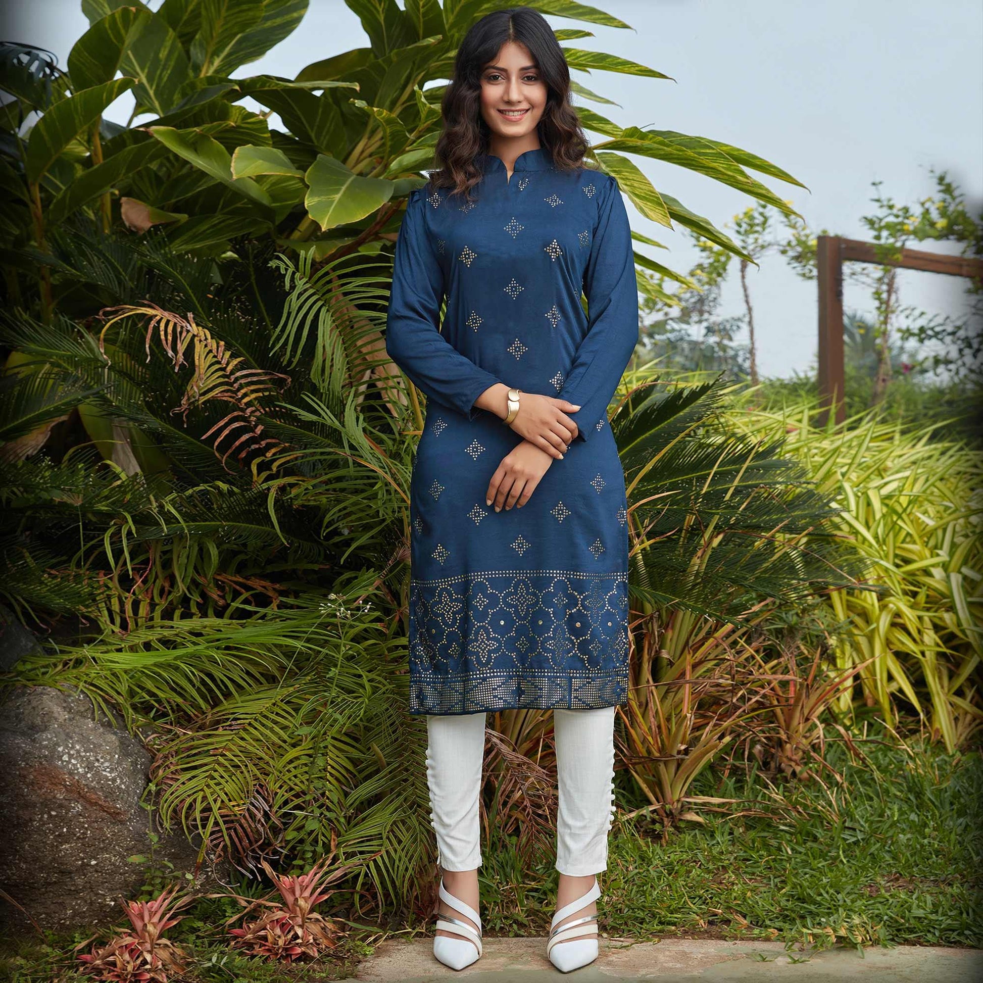 Engrossing Navy Blue Casual Wear Glistering Embellishment Silky Cotton Kurti