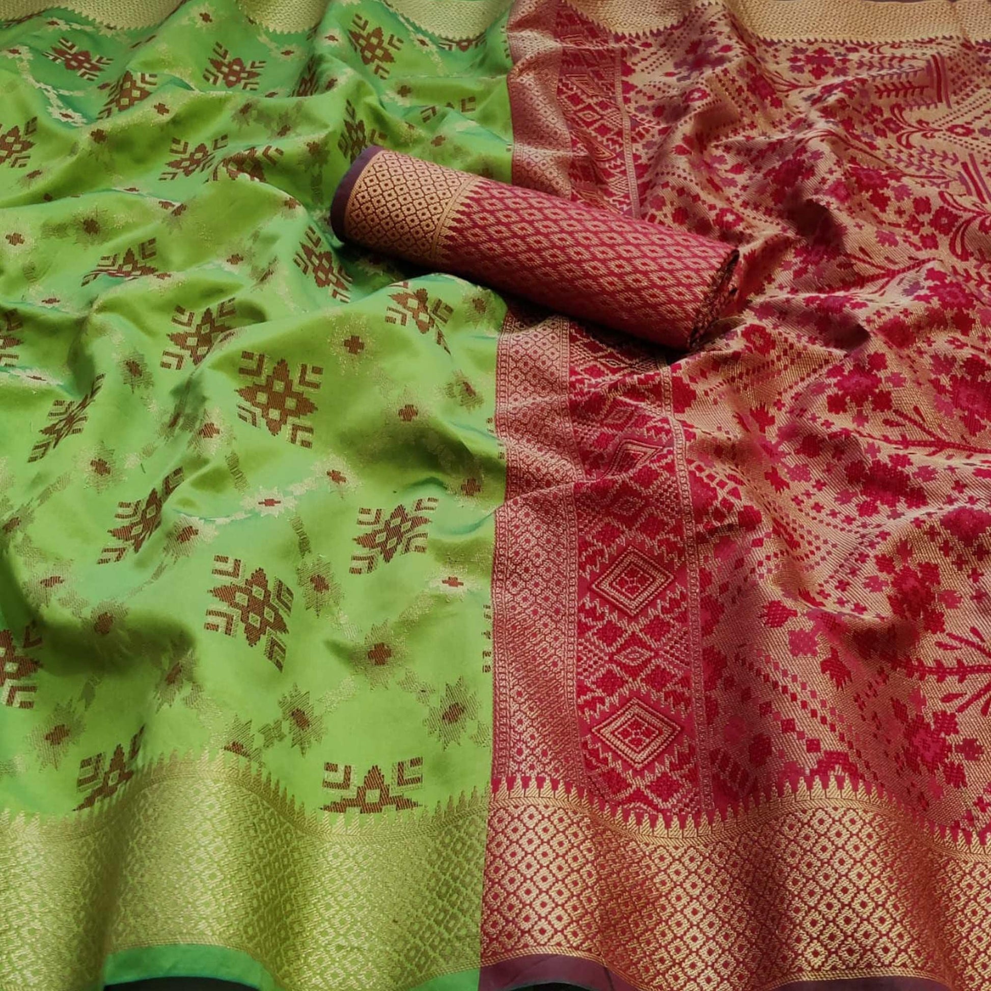Engrossing Pista Green Colored Festive Wear Woven Patola Silk Saree