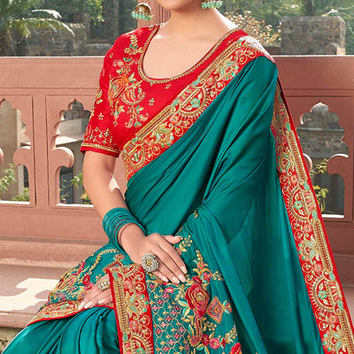 Engrossing Turquoise Blue Colored Partywear Embroidered Satin - Gerogette Saree