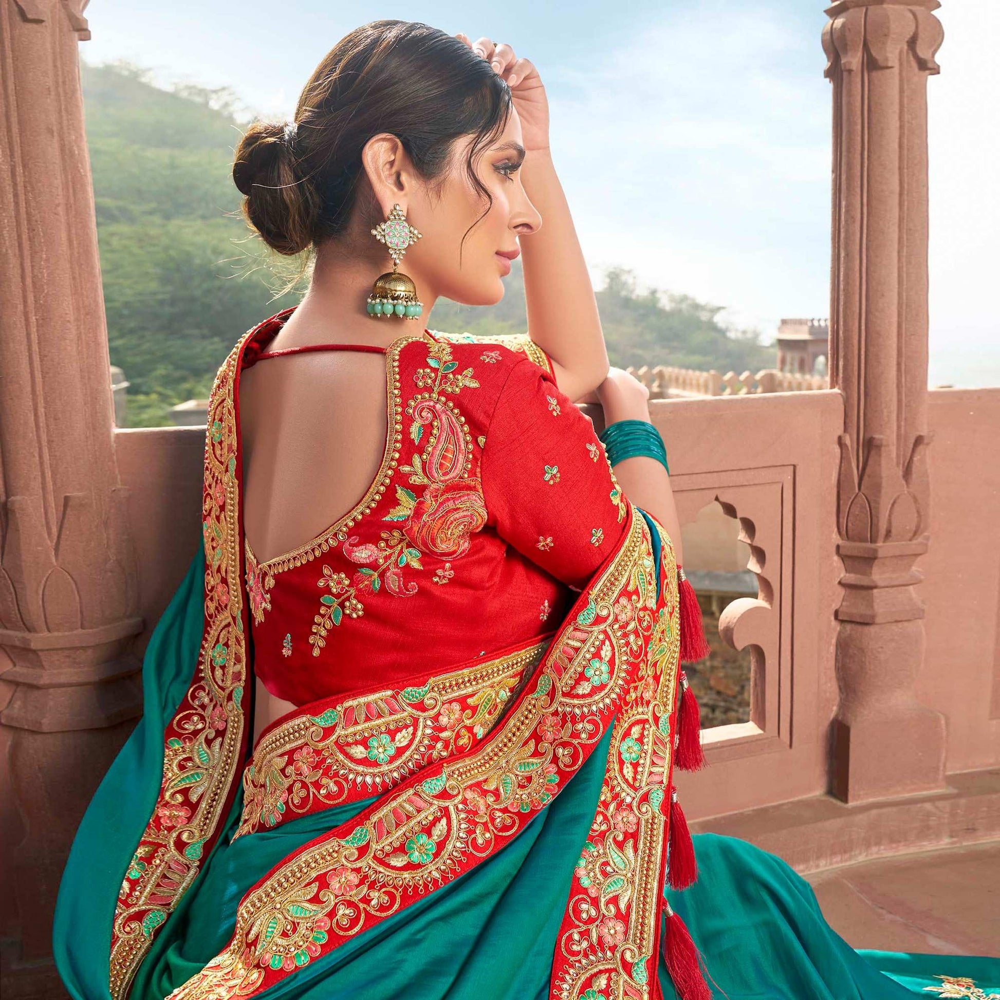 Engrossing Turquoise Blue Colored Partywear Embroidered Satin - Gerogette Saree