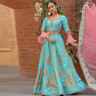 Entrancing Baby Blue Colored Partywear Embroidered Silk Lehenga Choli
