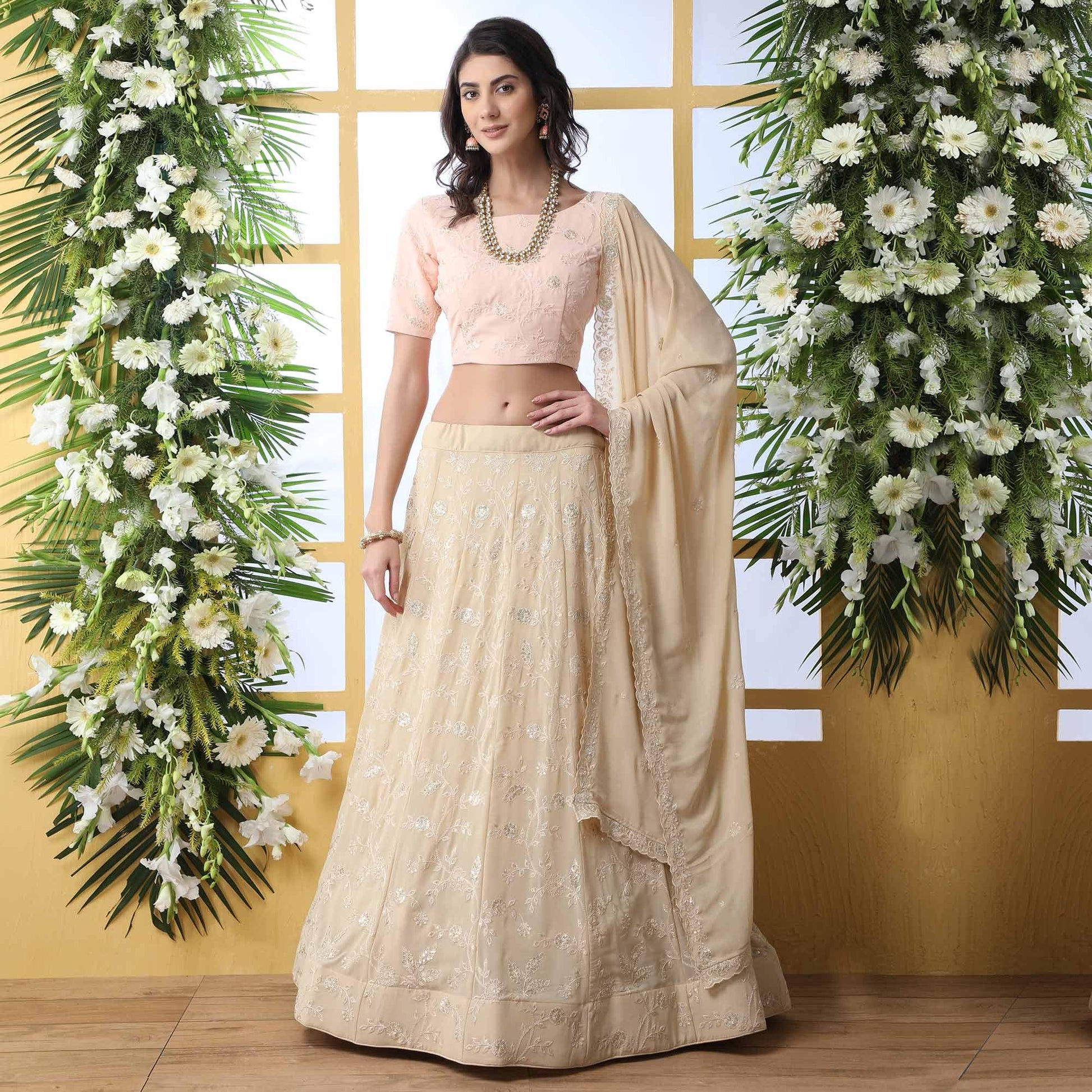 Entrancing Beige Colored Party Wear Embroidered Georgette Legenga Choli