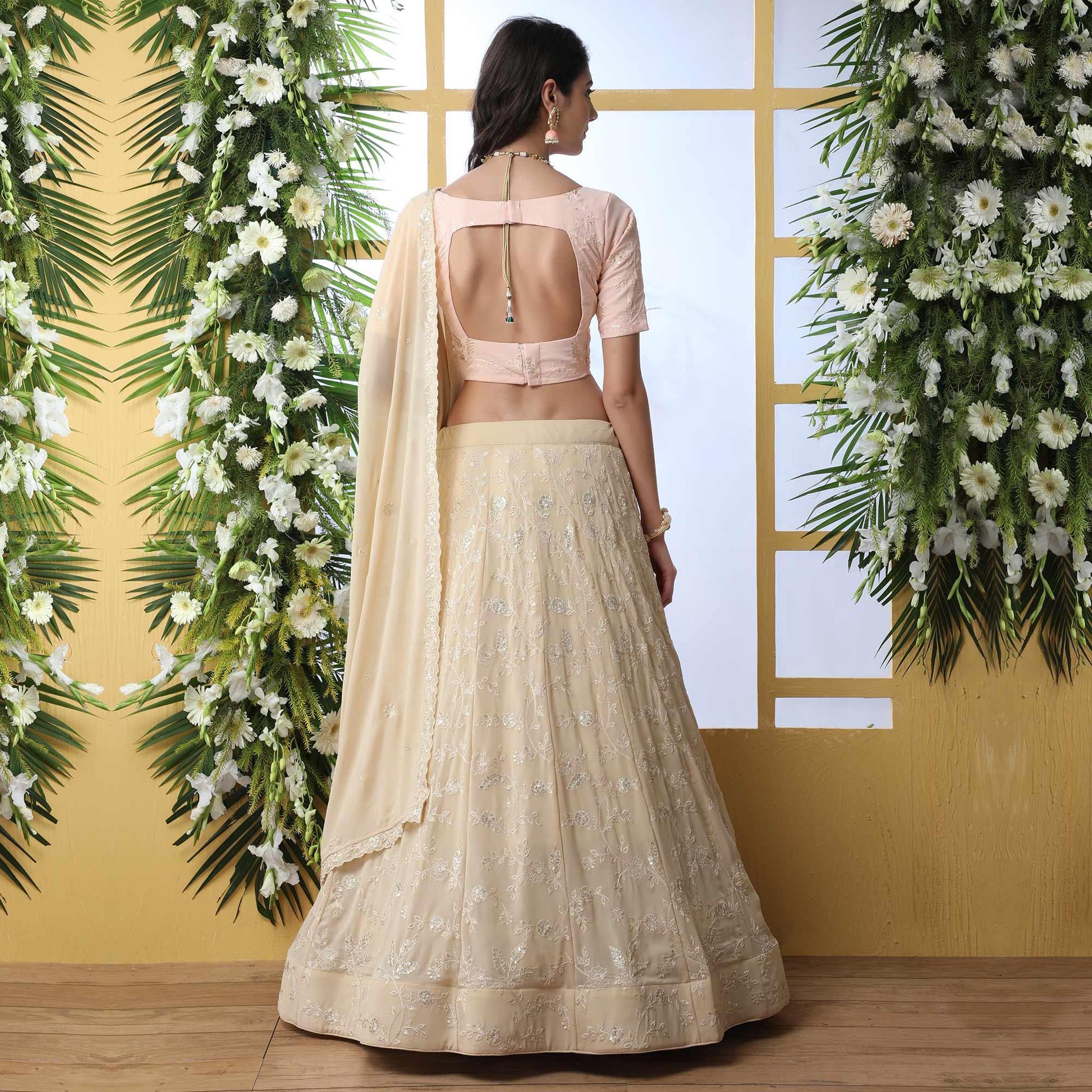Entrancing Beige Colored Party Wear Embroidered Georgette Legenga Choli