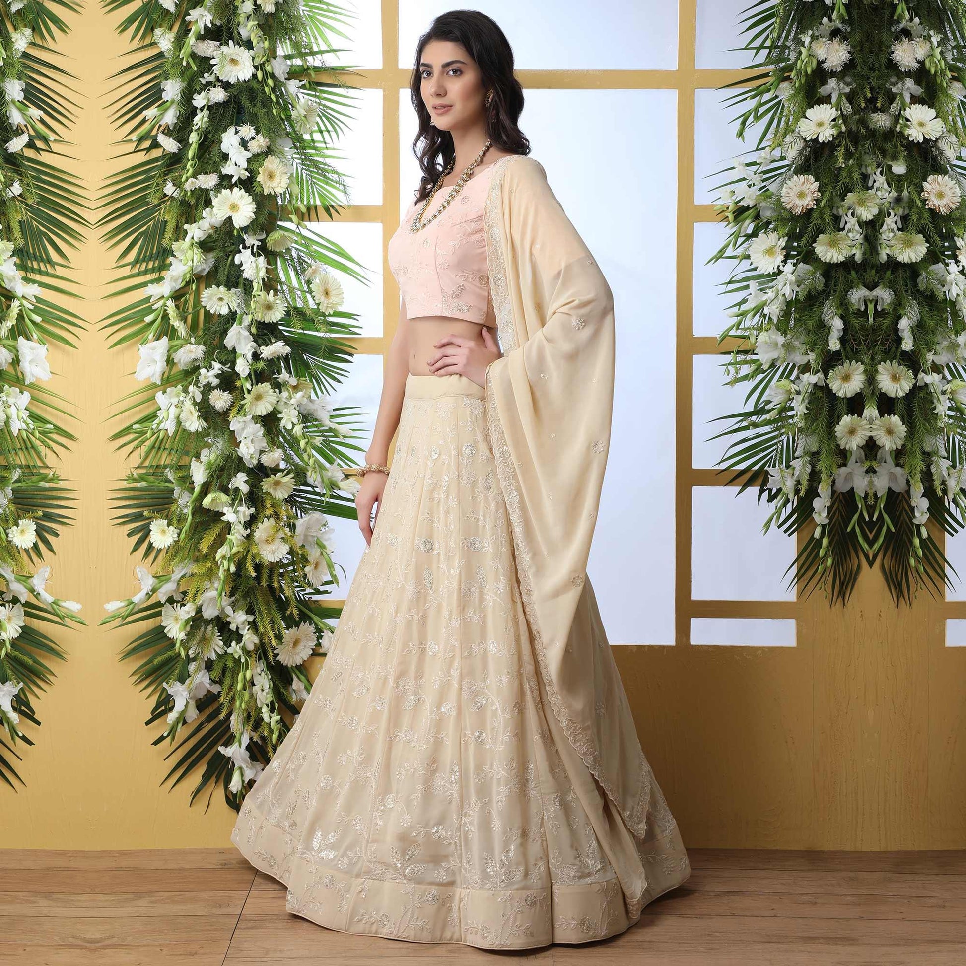 Entrancing Beige Colored Party Wear Embroidered Georgette Legenga Choli
