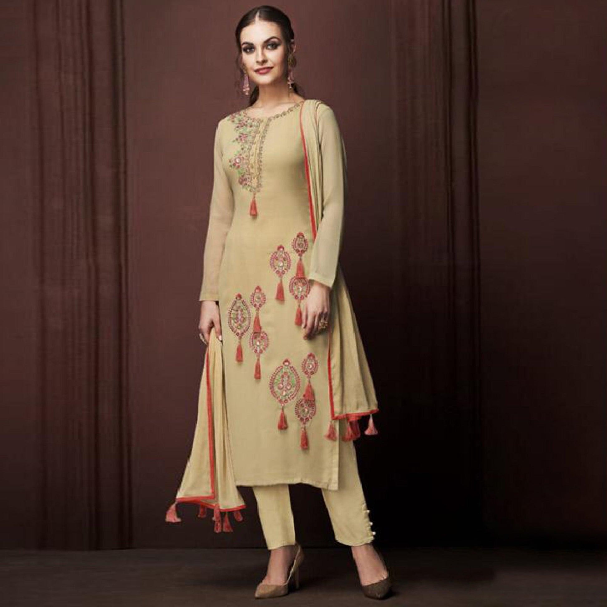 Entrancing Beige Colored Partywear Embroidered Georgette Suit