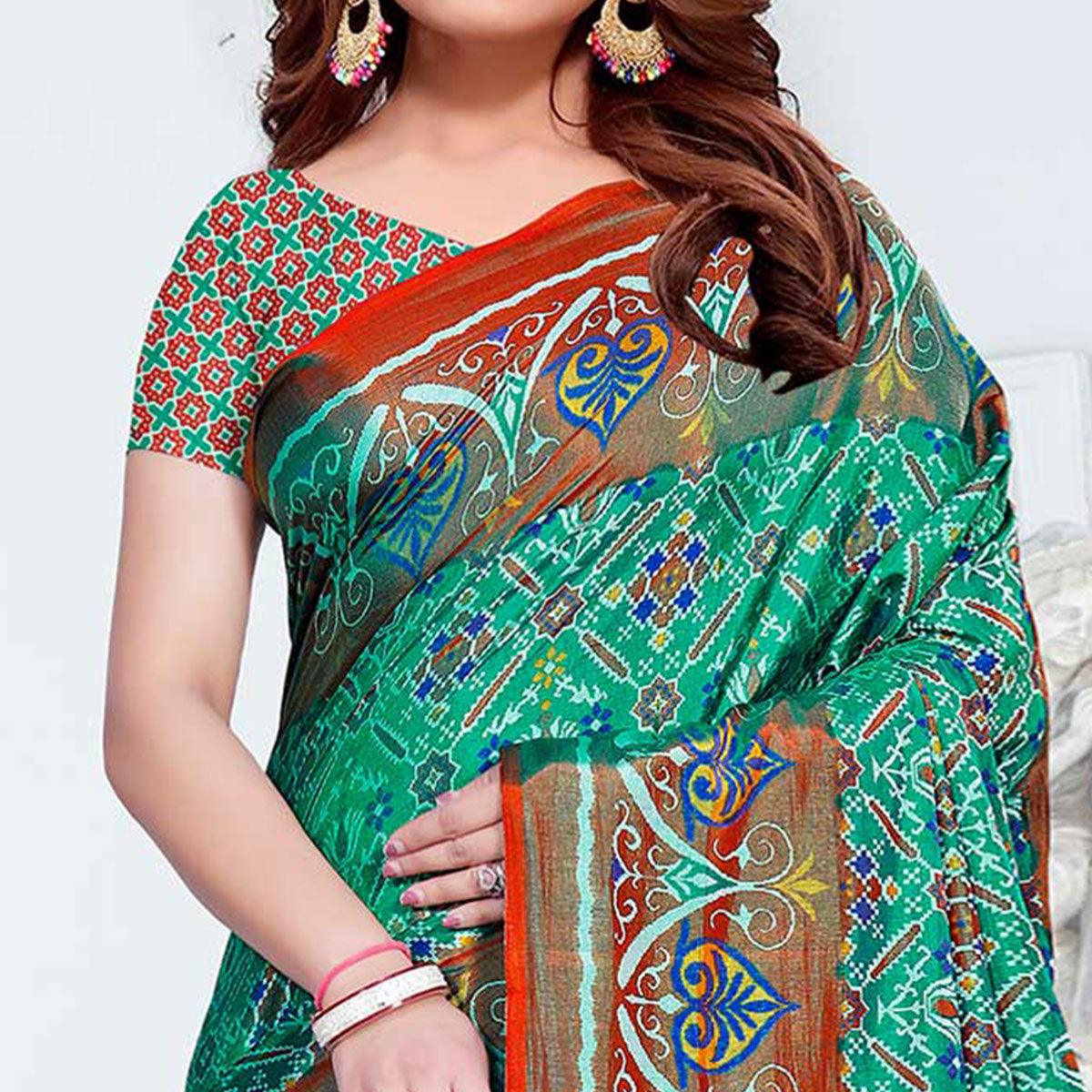 Entrancing Green Colored Casual Printed Patola Printed Art Silk Saree