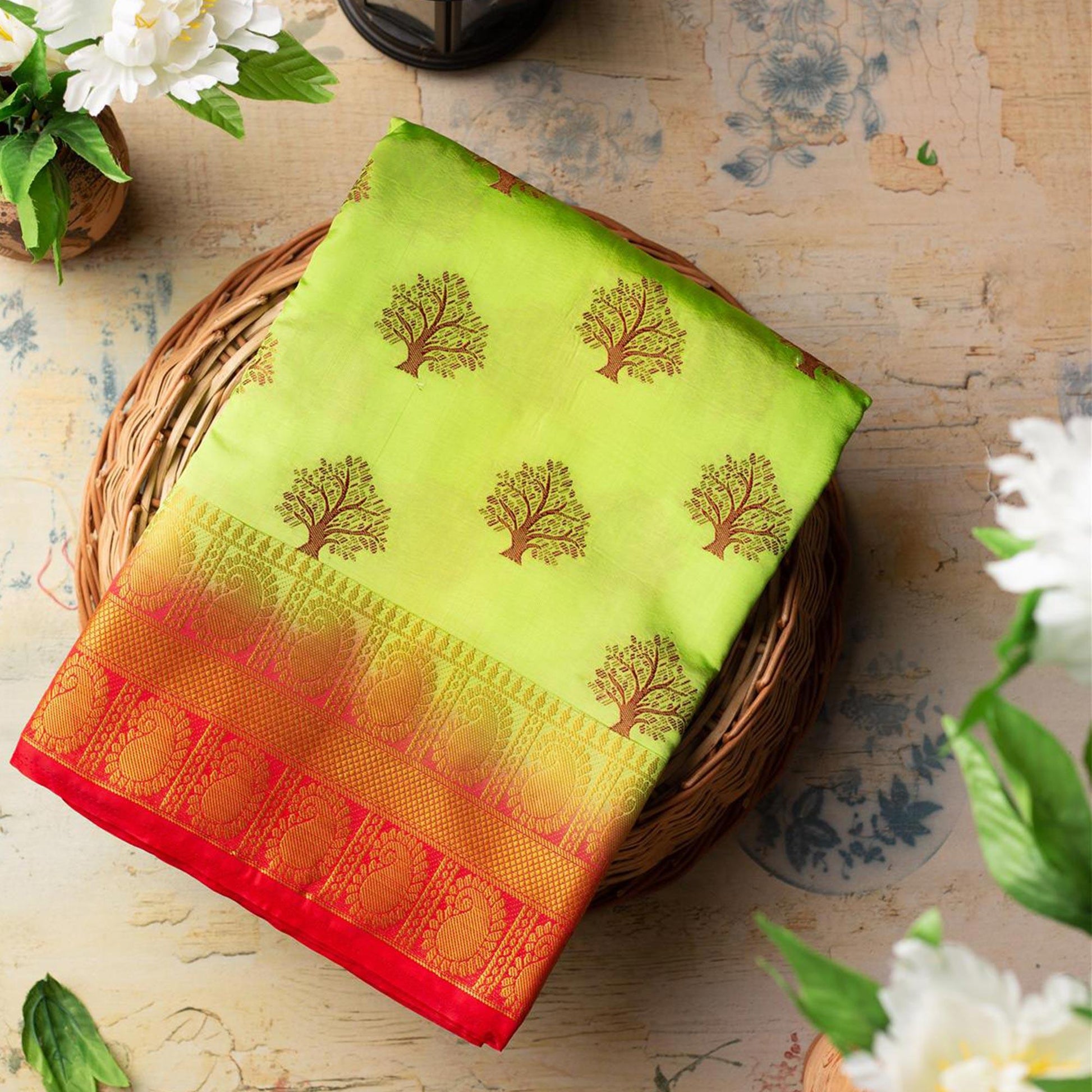 Entrancing Green Colored Festive Wear Woven Art Silk Saree