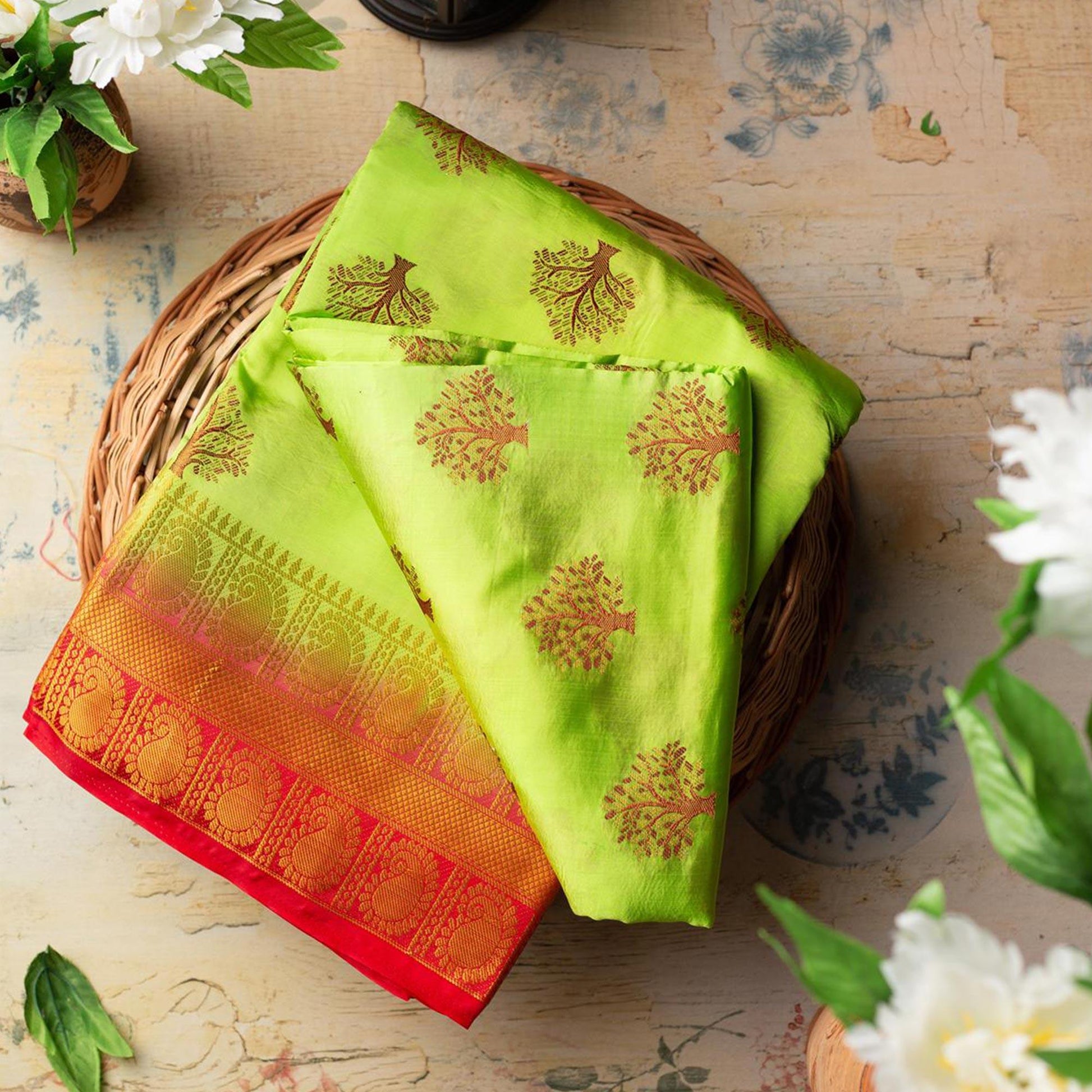 Entrancing Green Colored Festive Wear Woven Art Silk Saree