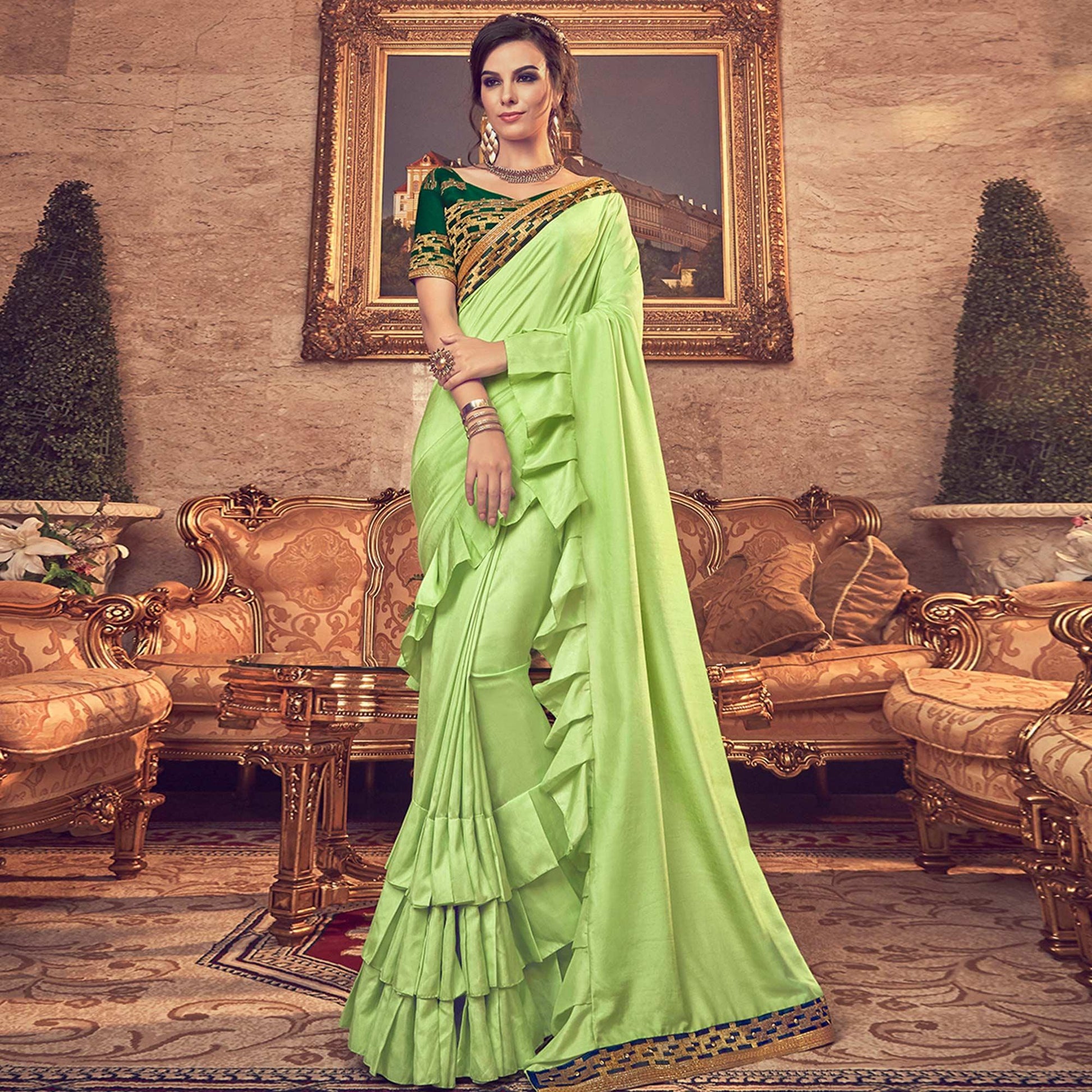 Entrancing Green Colored Partywear Embroidered Georgette Saree