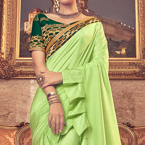 Entrancing Green Colored Partywear Embroidered Georgette Saree