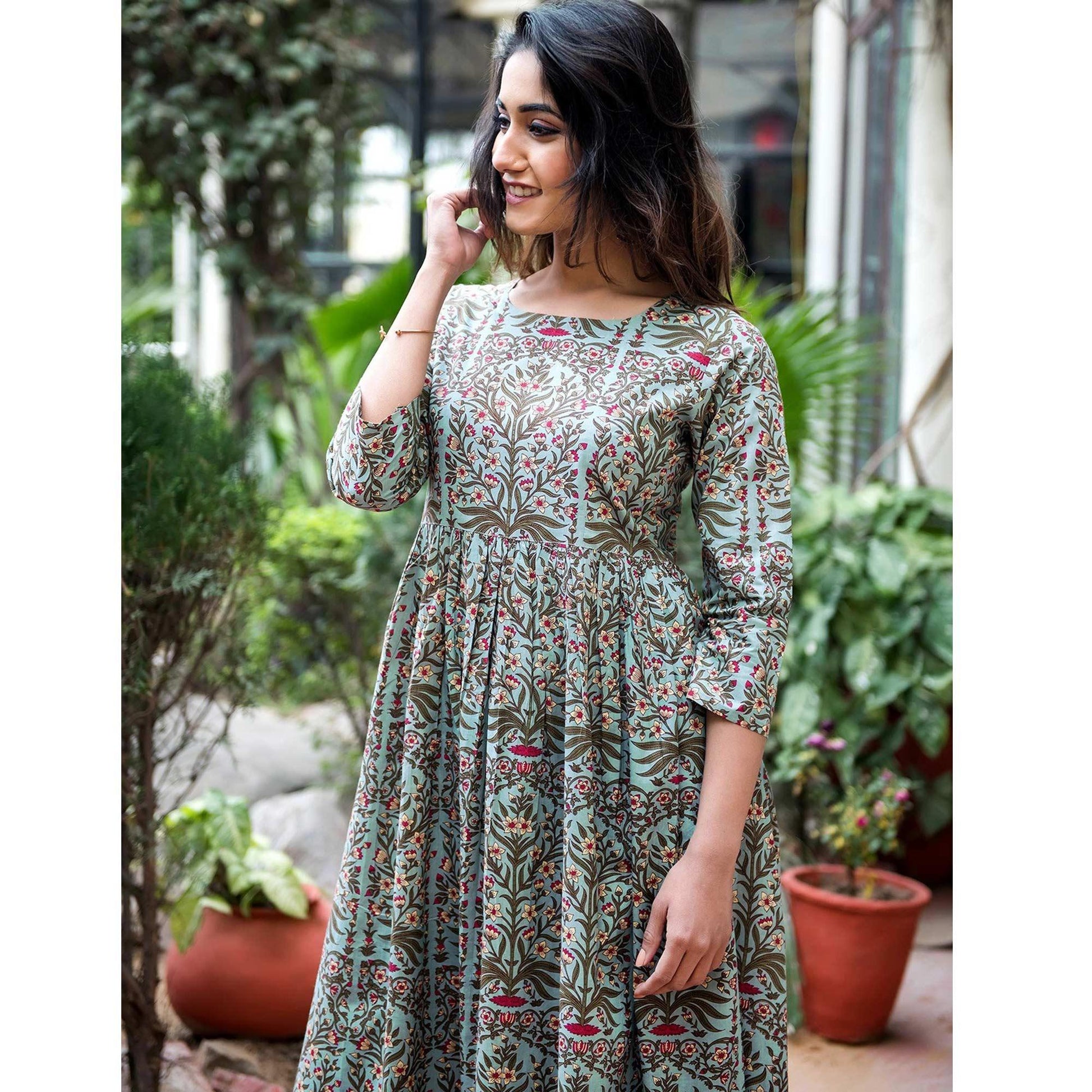 Entrancing Light Blue Colored Casual Printed Muslin Blend Gown