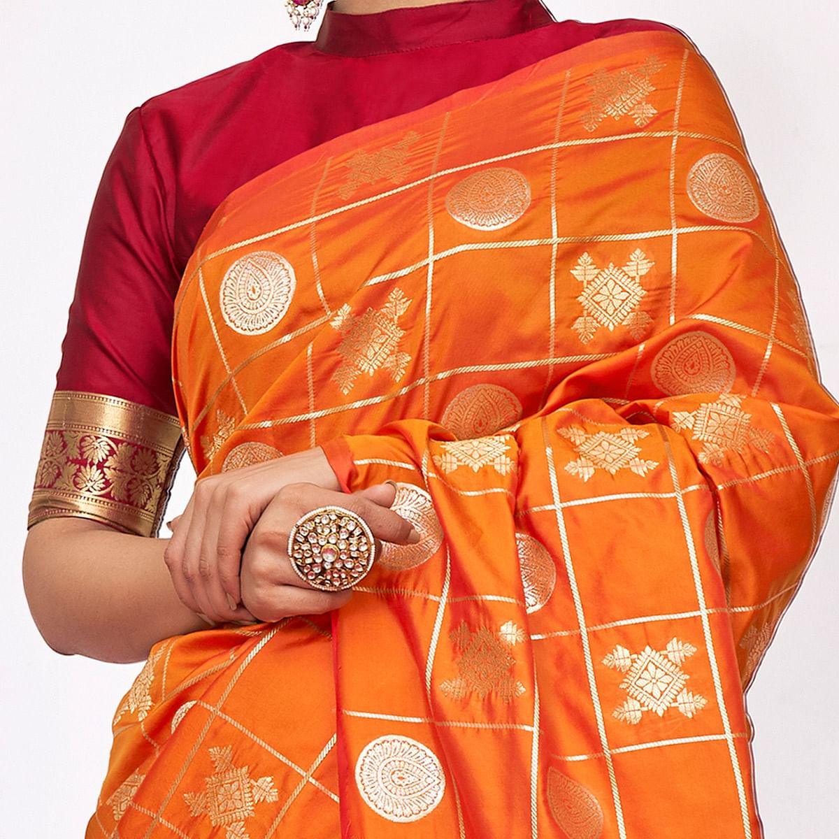 Entrancing Orange Colored Festive Wear Woven Silk Saree