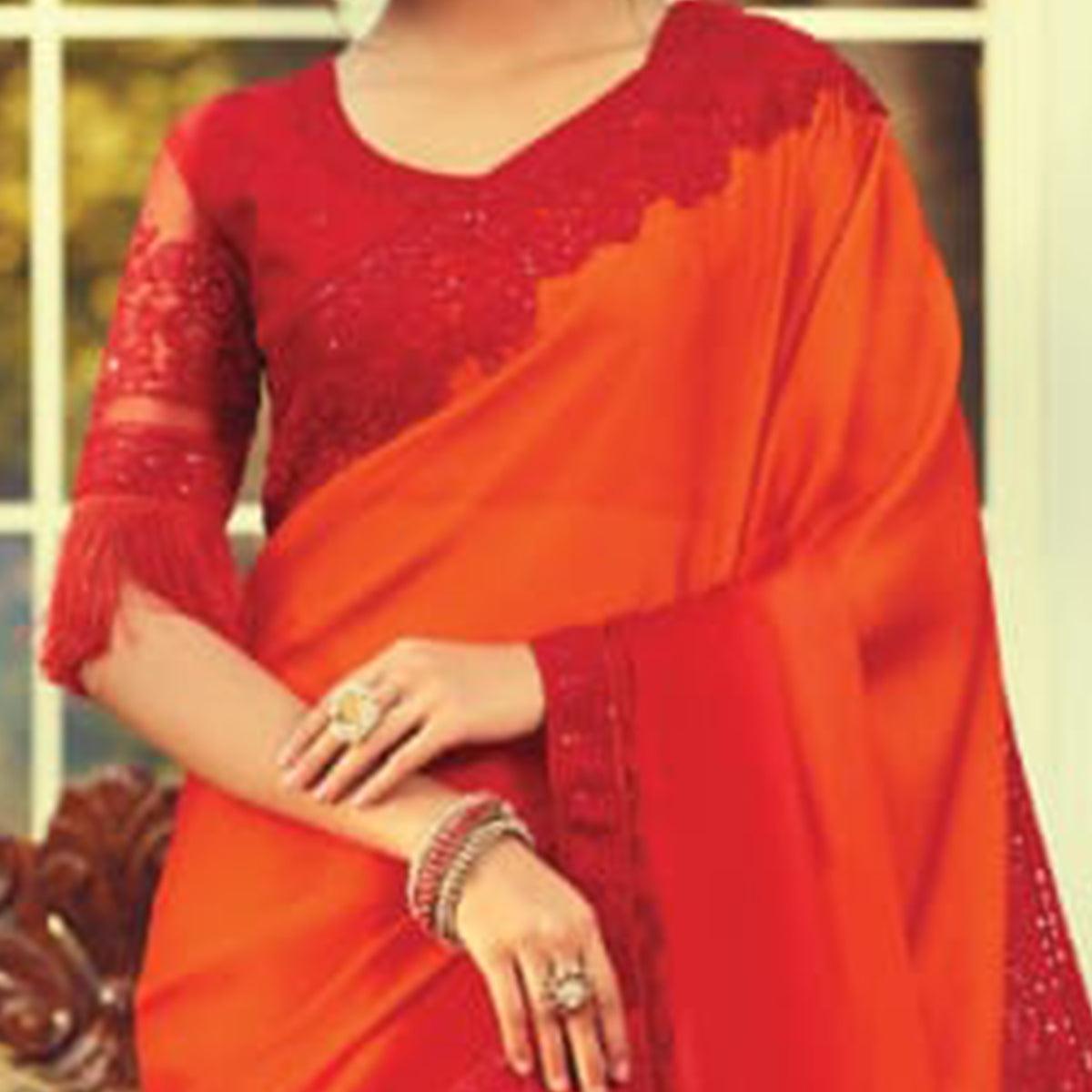 Entrancing Orange Colored Partywear Embroidered Silk Saree