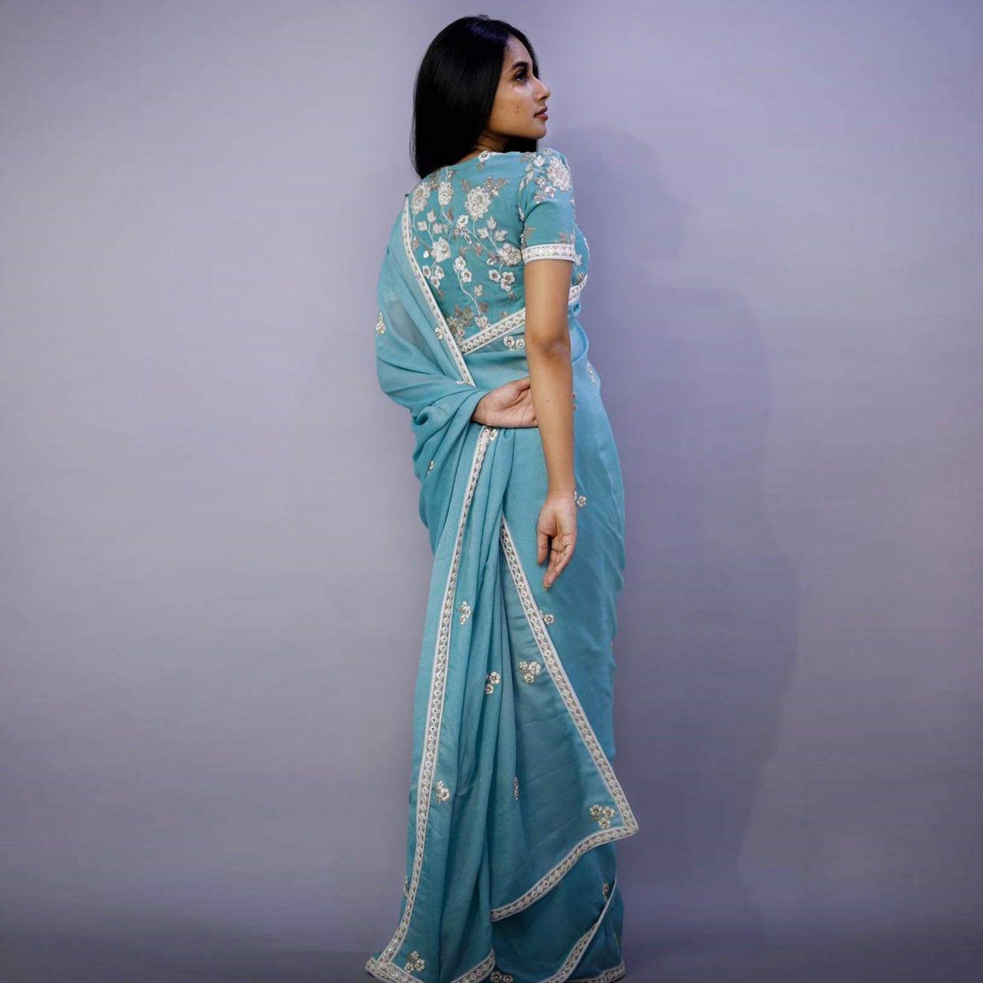 Entrancing Sky Blue Colored Partywear Embroidered Pure Heavy Rangoli Saree