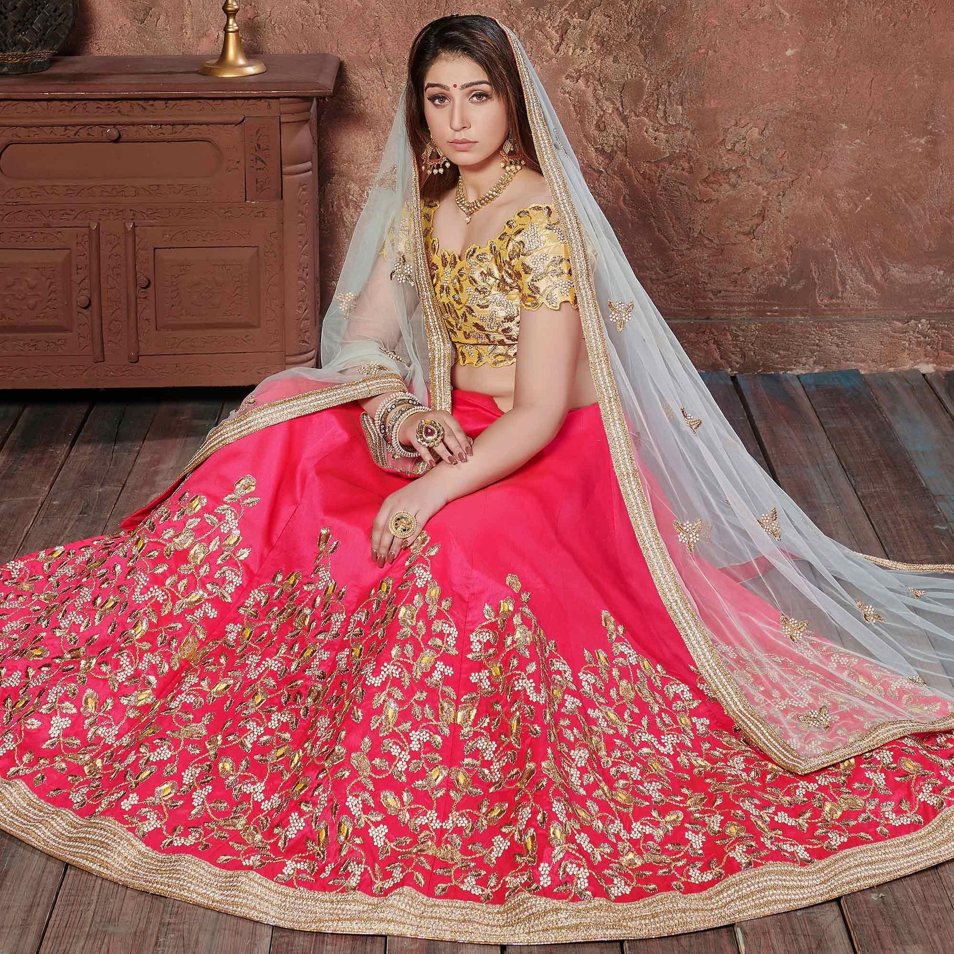 Entrancing Yellow-Pink Colored Wedding Wear Embroidered Mulberry Silk Lehenga Choli