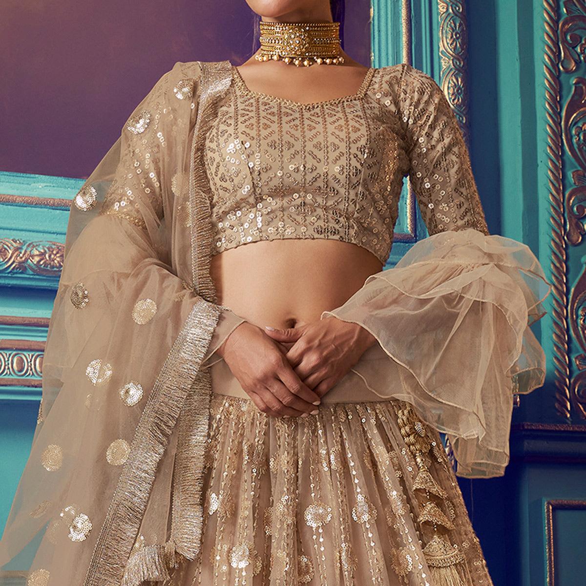 Ethnic Beige Colored Partywear Embroidered Soft Net Lehenga Choli