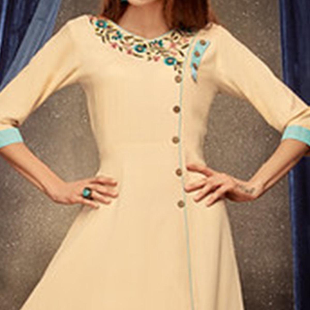 Ethnic Cream Colored Partywear Embroidered Rayon Long Kurti