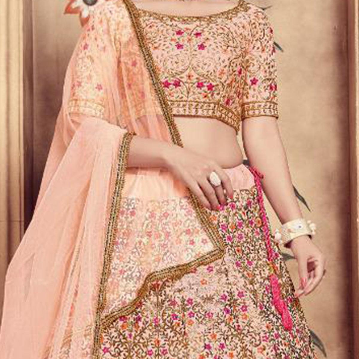 Ethnic Peach Colored Party Wear Embroidered Silk Lehenga Choli