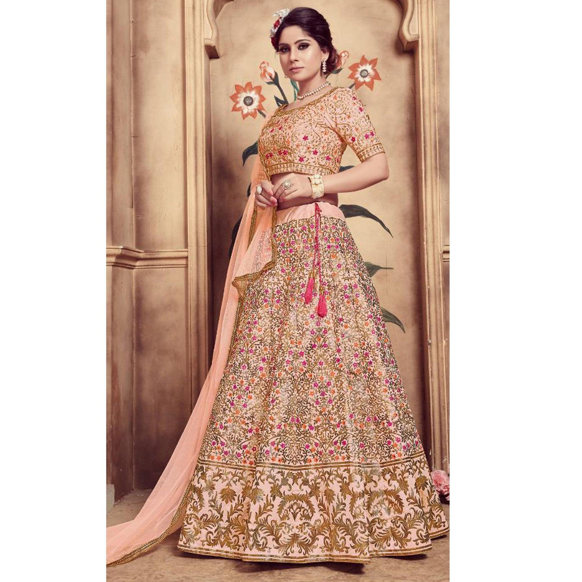 Ethnic Peach Colored Party Wear Embroidered Silk Lehenga Choli