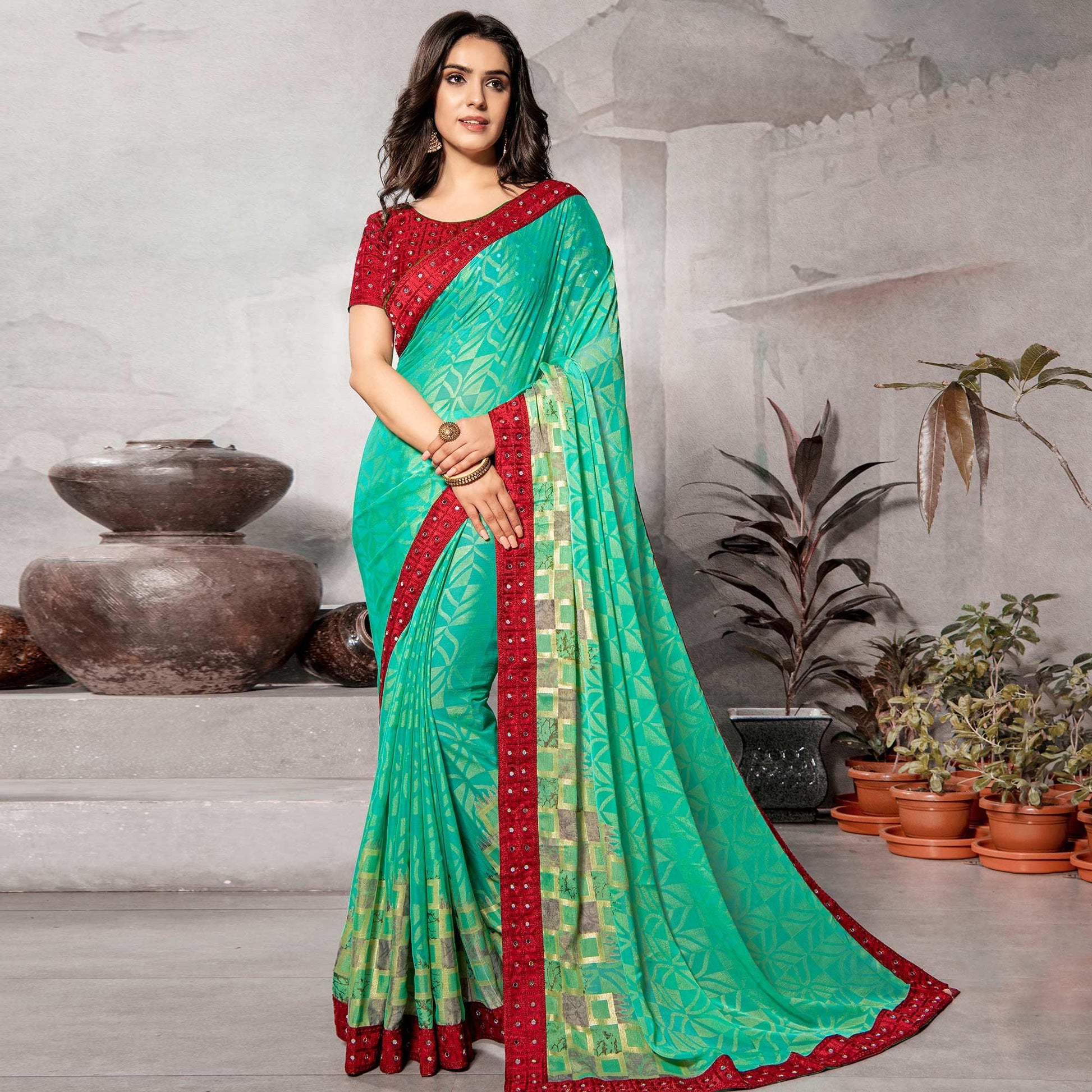 Ethnic Turquoise Blue Colored Partywear Embroidered Chiffon Brasso Saree