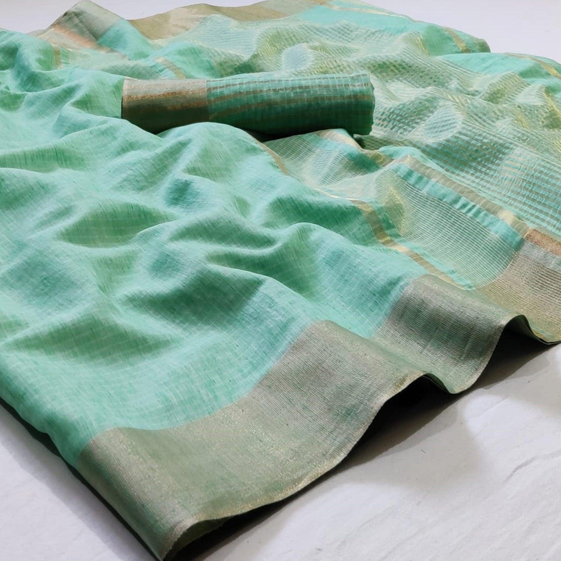Ethnic Turquoise Green Colored Festive Wear Woven Linen Saree