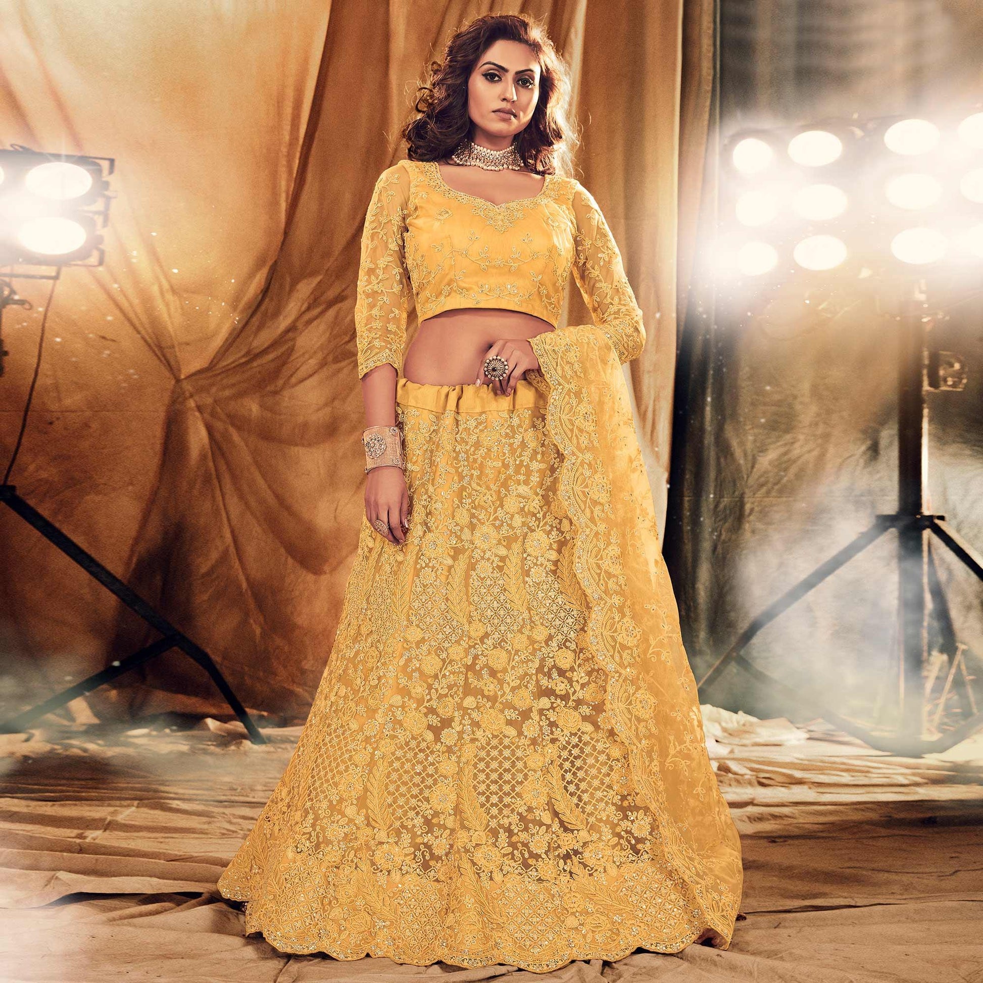 Ethnic Yellow Colored Wedding Wear Embroidered Net Lehenga Choli