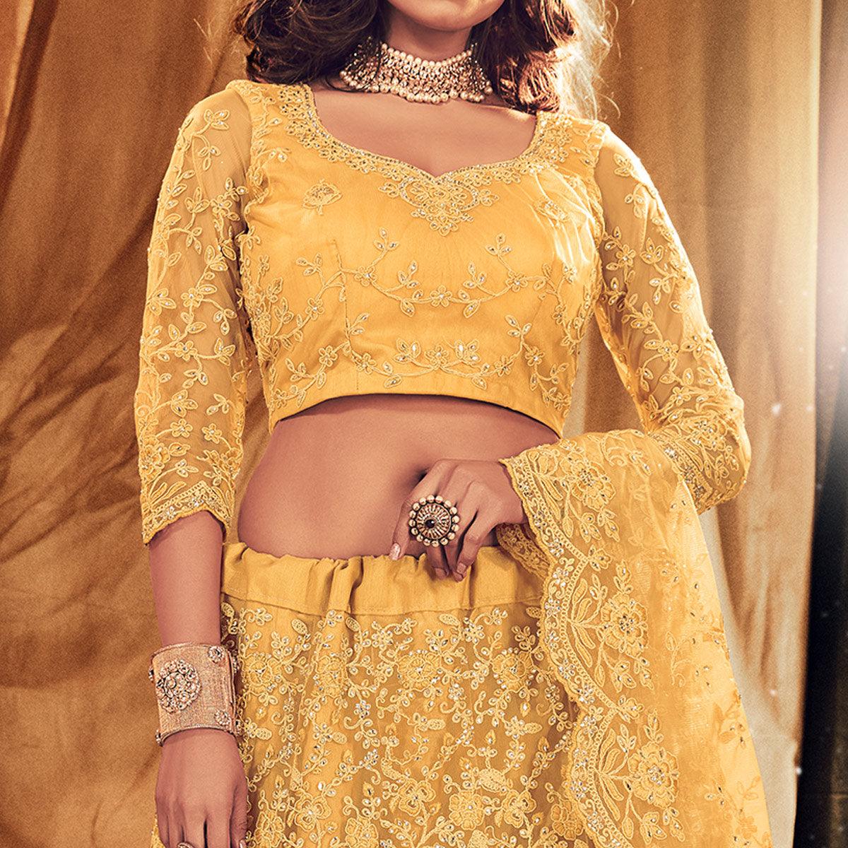 Ethnic Yellow Colored Wedding Wear Embroidered Net Lehenga Choli