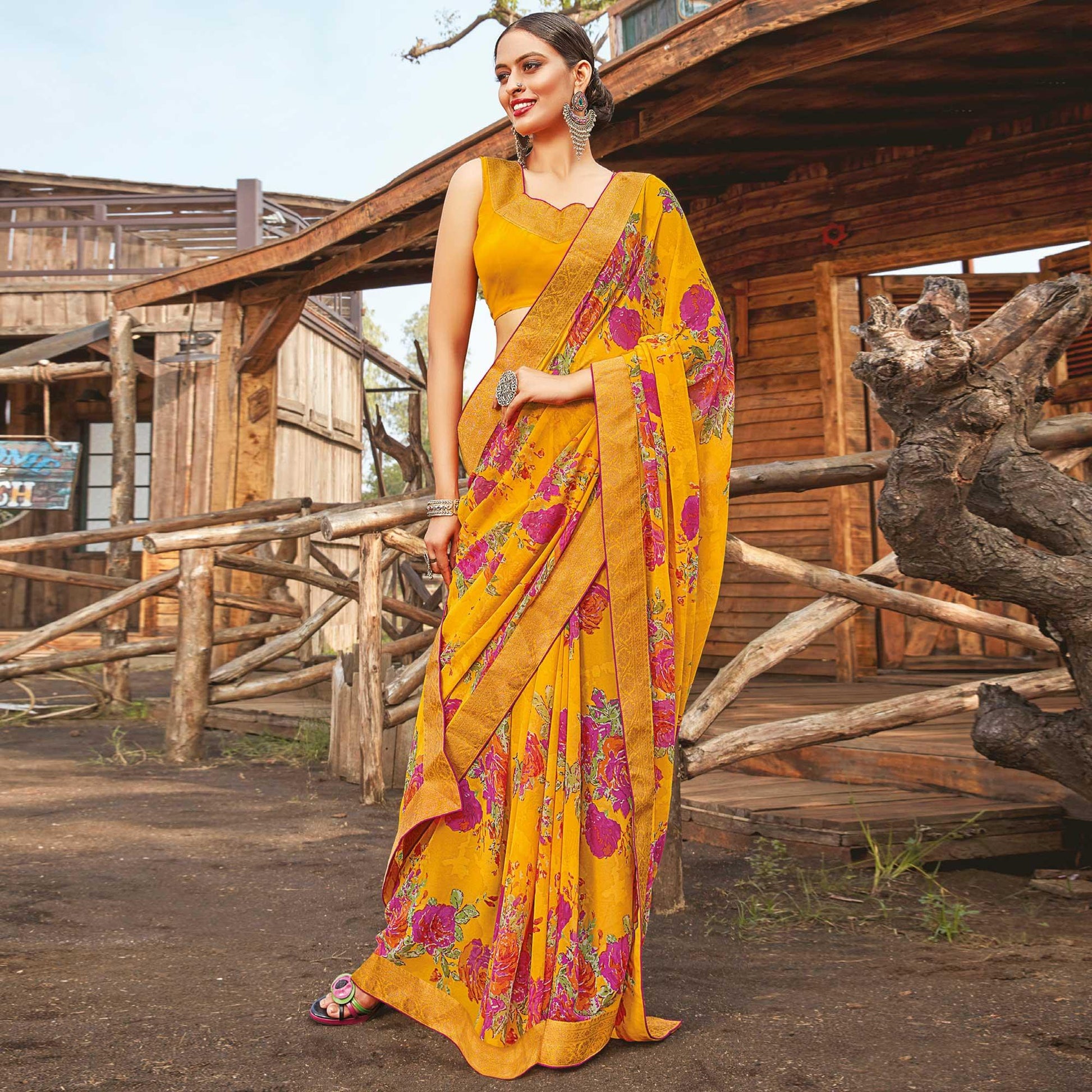 Ethnic Yellow Coloured Partywear Pure Georgette Floral Printed Saree With Fancy Lace Border