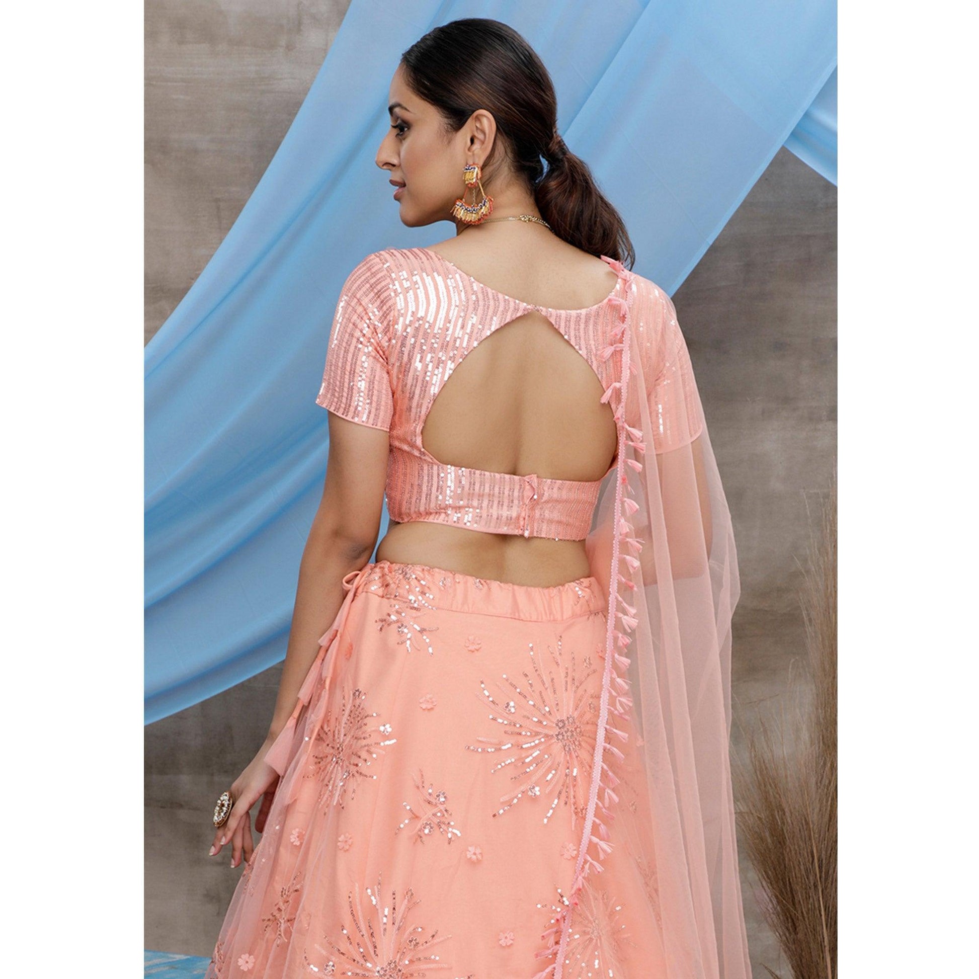 Excellent Orange Colored Designer Partywear Embroidered Net Lehenga Choli