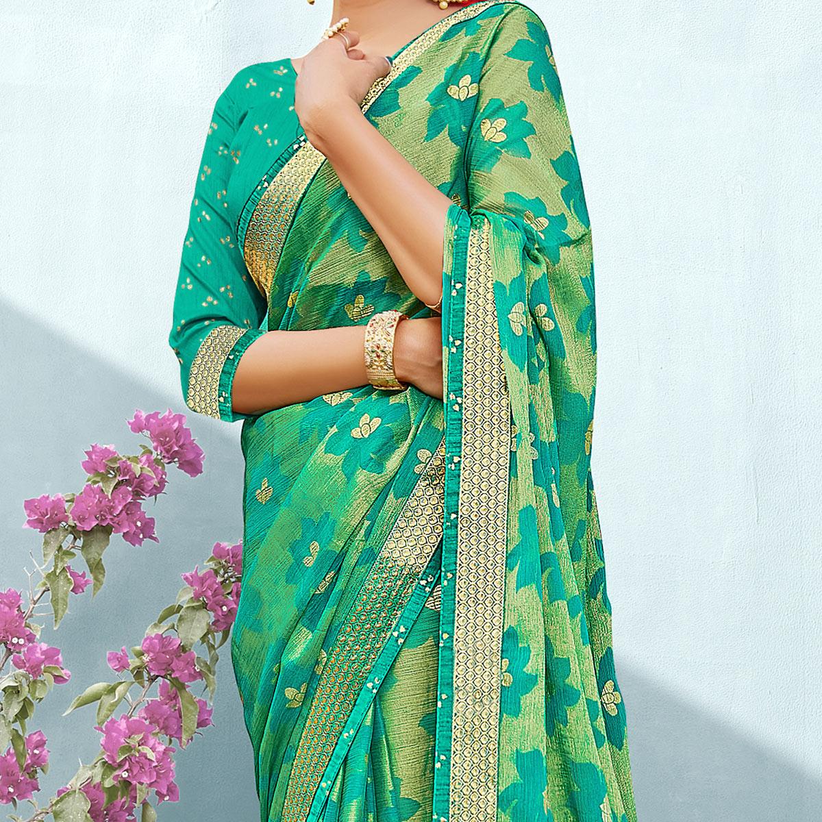 Excellent Sea Green Coloured Partywear Floral Printed Chiffon Brasso Saree