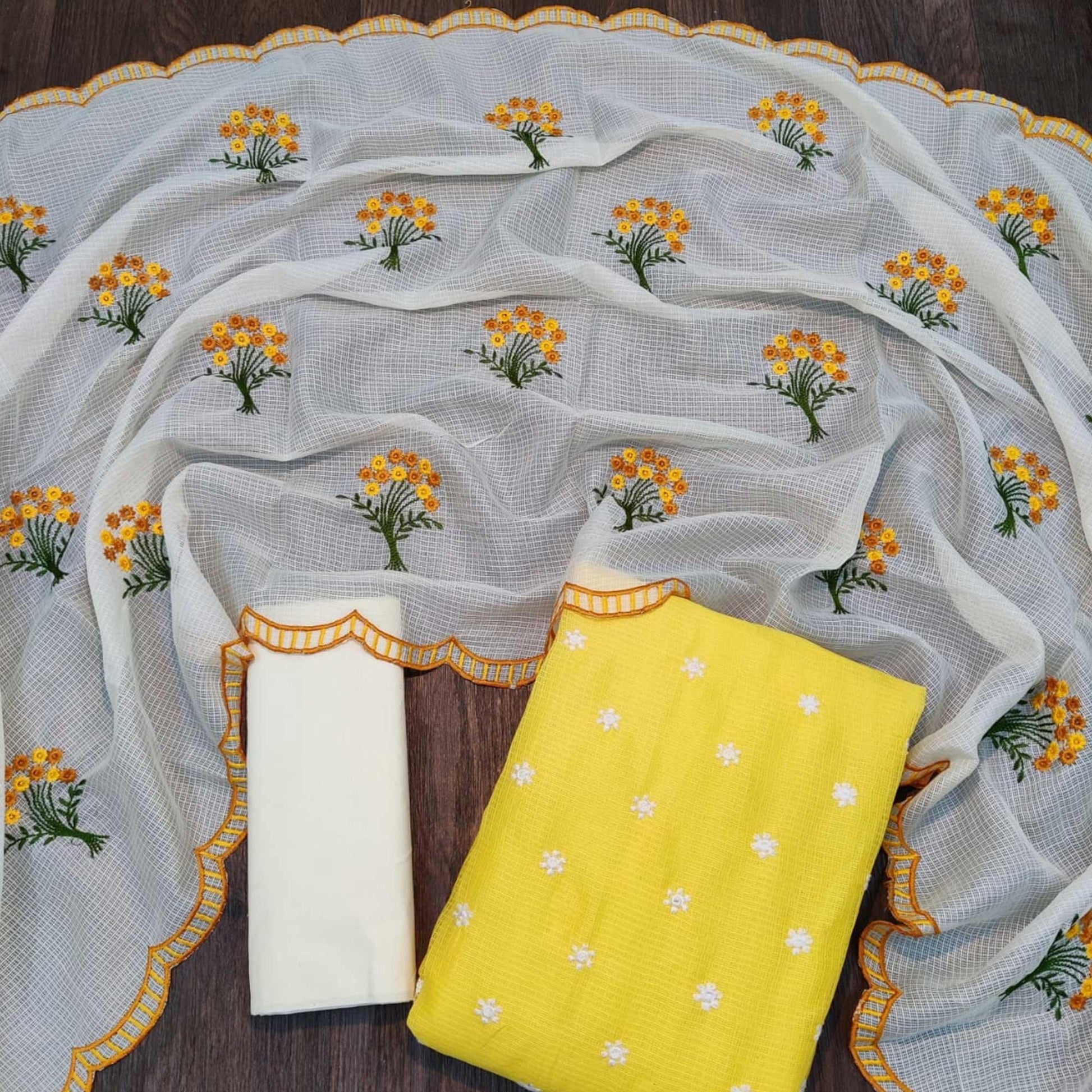 Excellent Yellow Colored Casual Wear Embroidered Kota Checks Dress Material