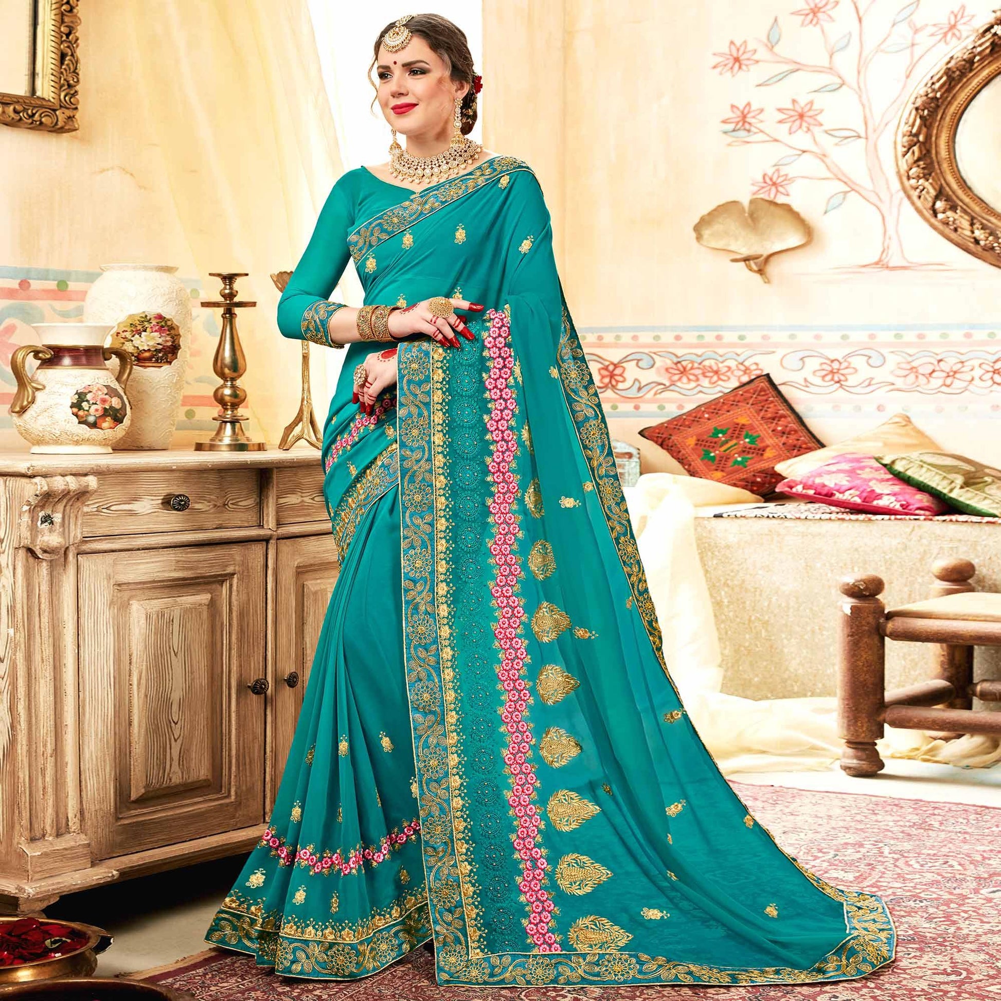 Exceptional Aqua Blue Colored Partywear Embroidered Georgette Saree